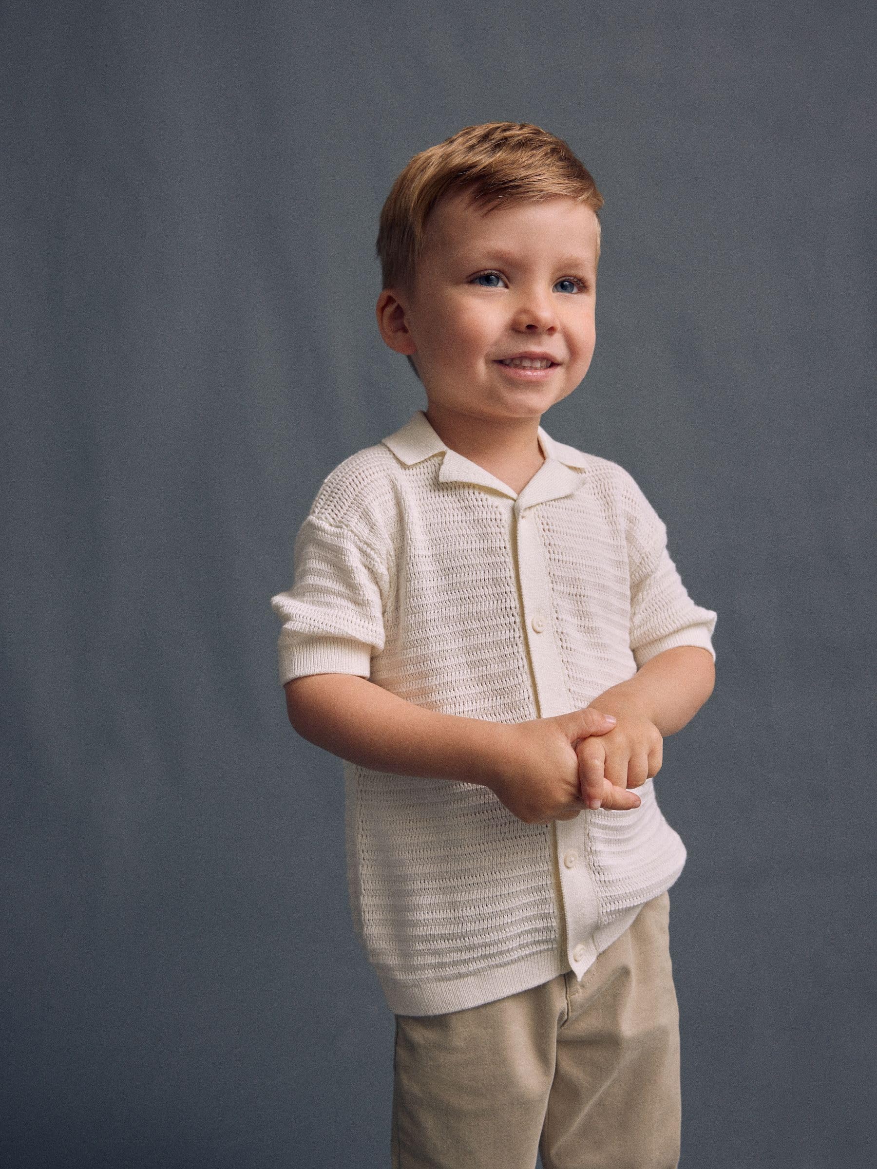 NEXT Garçon Polo en Maille 100% Coton à Manches Courtes texturé et col à Revers