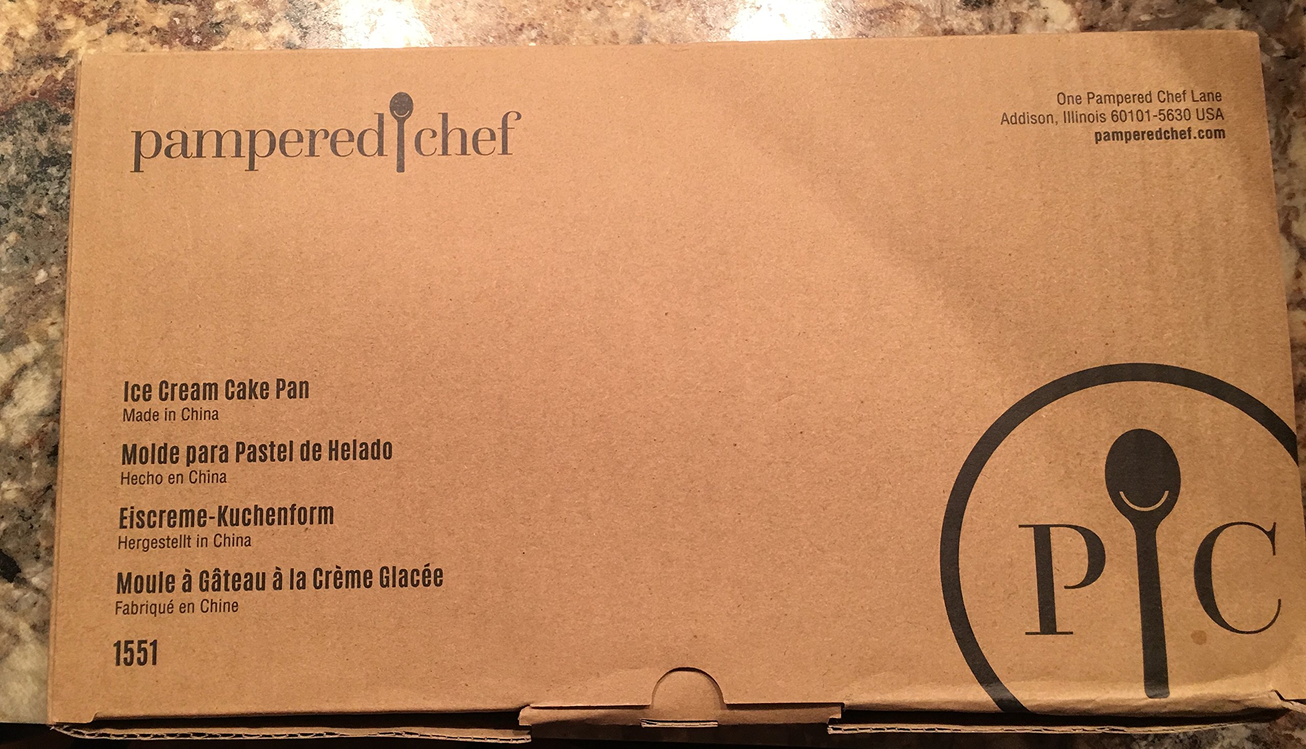 Pampered Chef #1551 Ice Cream Cake Pan, showing its non-stick surface and two-piece design.
