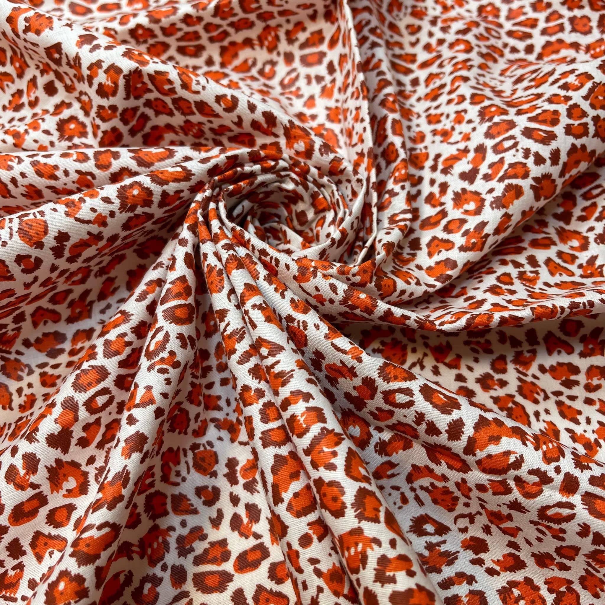 100% Cotton Poplin Printed Fabric โ Vintage Floral, Ditsy, Animal, Polka, Stars | Soft & Lightweight Dress & Craft Material | 45" (112cm) Wide | Sold Per Meter (Pre-Cut Lengths) (Orange Leopard) โ image 1