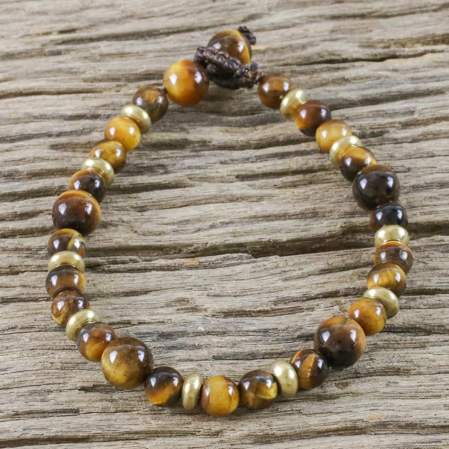 NOVICA Artisan Handmade Tigers Eye Beaded Bracelet Crafted of Brass Brown Or Gold Thailand [7.75 in min L x 8.25 in max L 8 mm W] ' Courageous Eye'