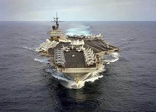 Home Comforts Bow View of The U.S. Navy Aircraft Carrier USS John F. Kennedy (CV-67) underway During The Cease-fir Vivid Imagery Laminated Poster Print-20 Inch by 30 Inch Laminated Poster