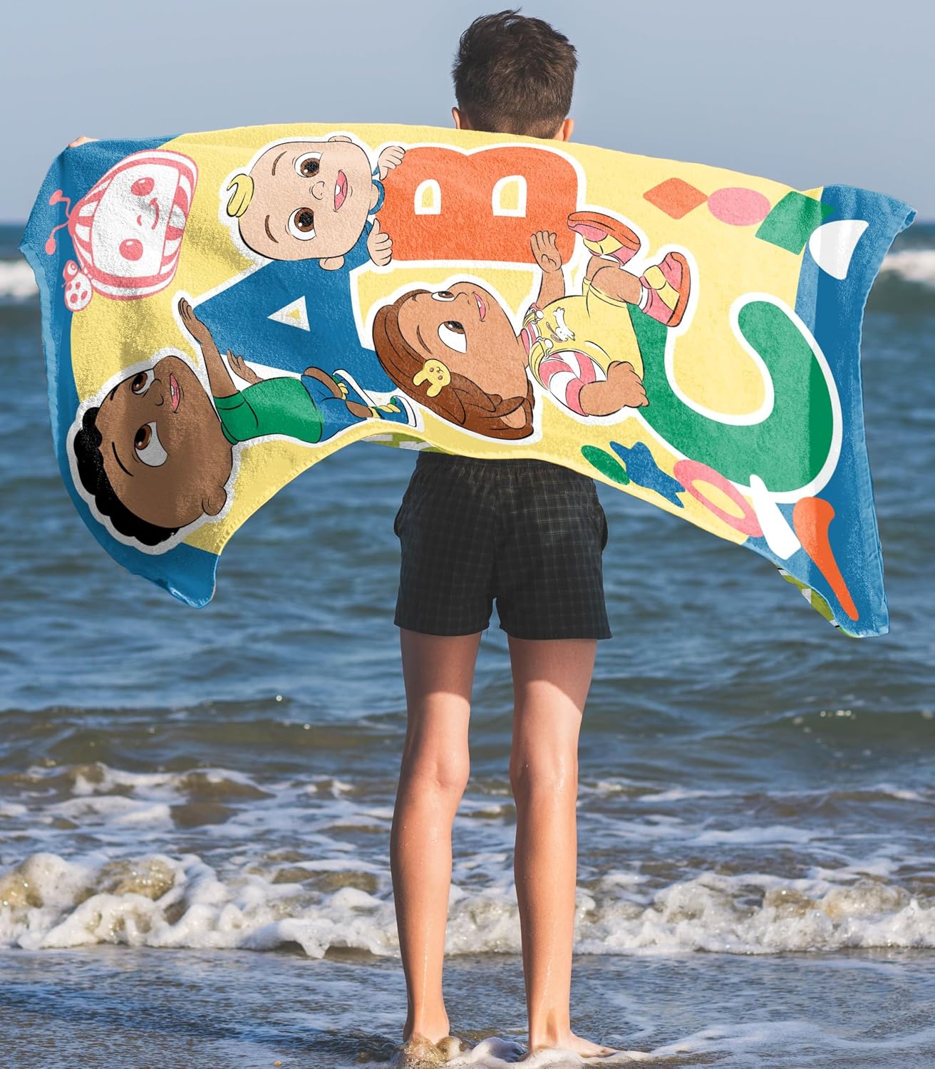 Jay Franco CoComelon Bath Pool Beach Towel - Kids Super Soft & Absorbent 100% Cotton Towel with JJ, Cody and Nina, Measures 28 x 58