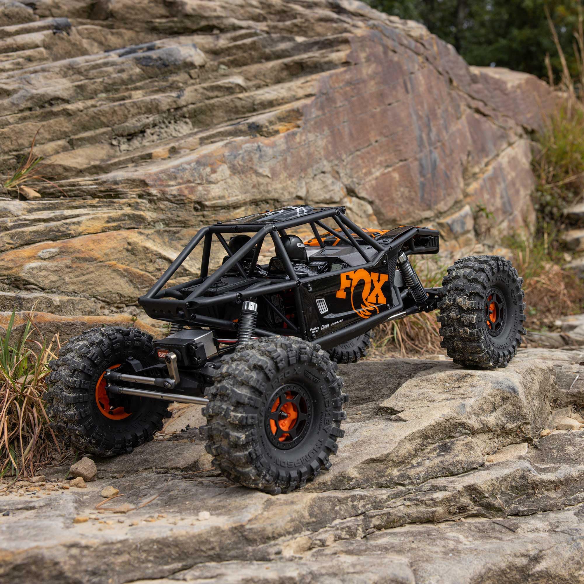 Axial 1:10 UTB10 Capra 1.9 4WS 4x4 Ready to Run Rock Crawler - Coche Todoterreno teledirigido, Motor de Cepillo, sin batería ni Cargador, Color Naranja
