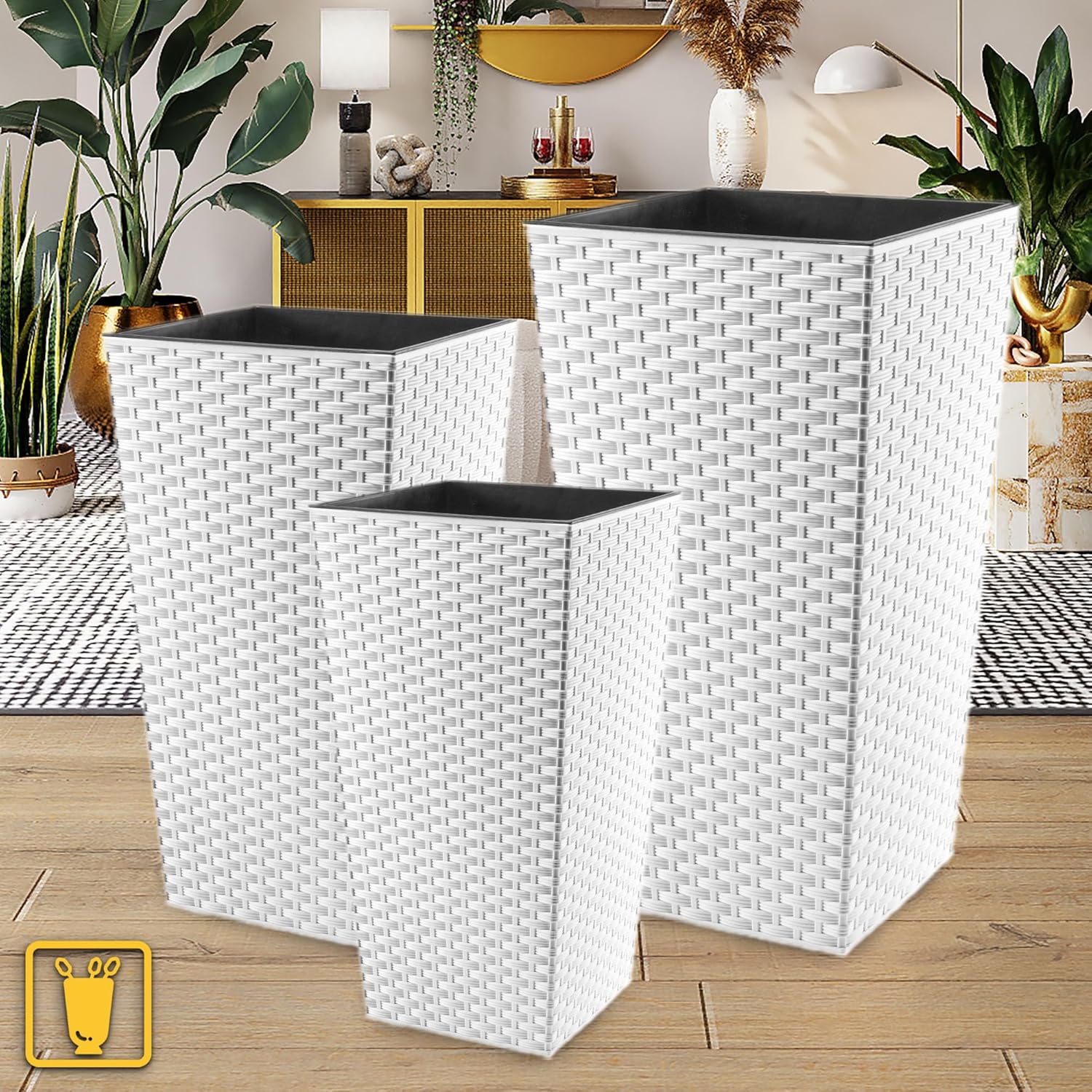 Three KADAX flower pots of different sizes in an indoor setting