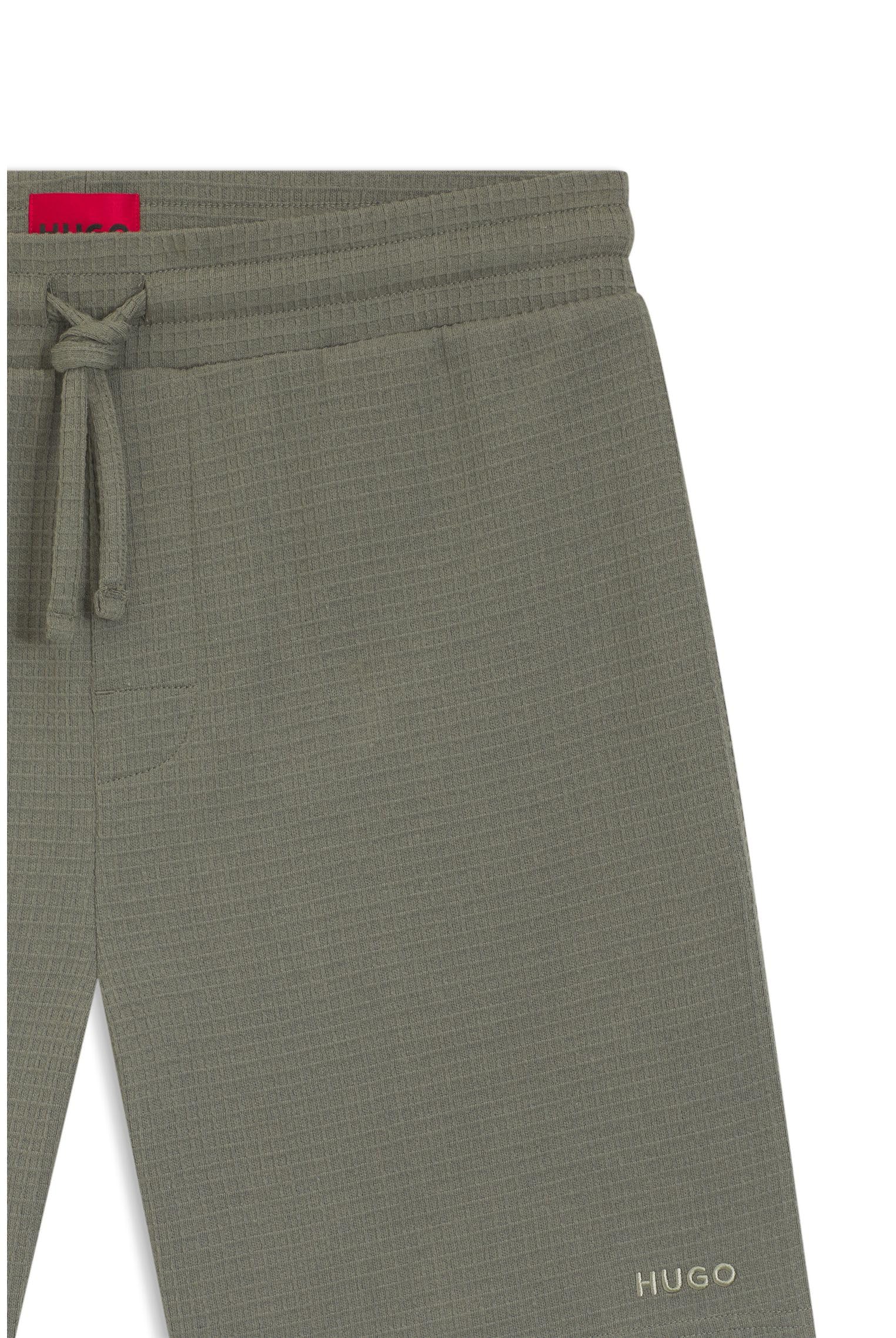 HUGO Herren Austin Shorts Pyjama-Shorts mit Waffelstruktur und Logo-Stickerei
