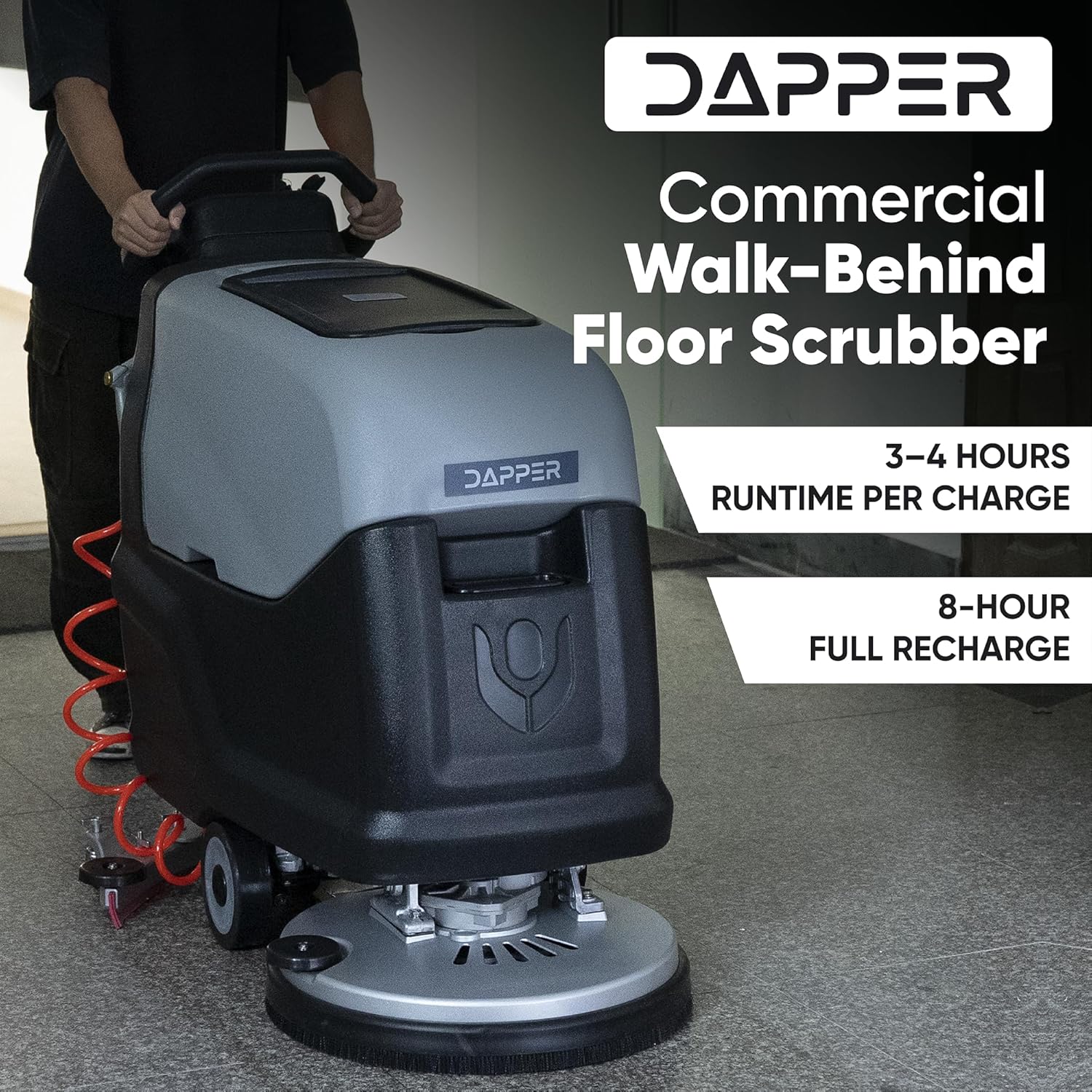 Person operating the Dapper Supply floor scrubber