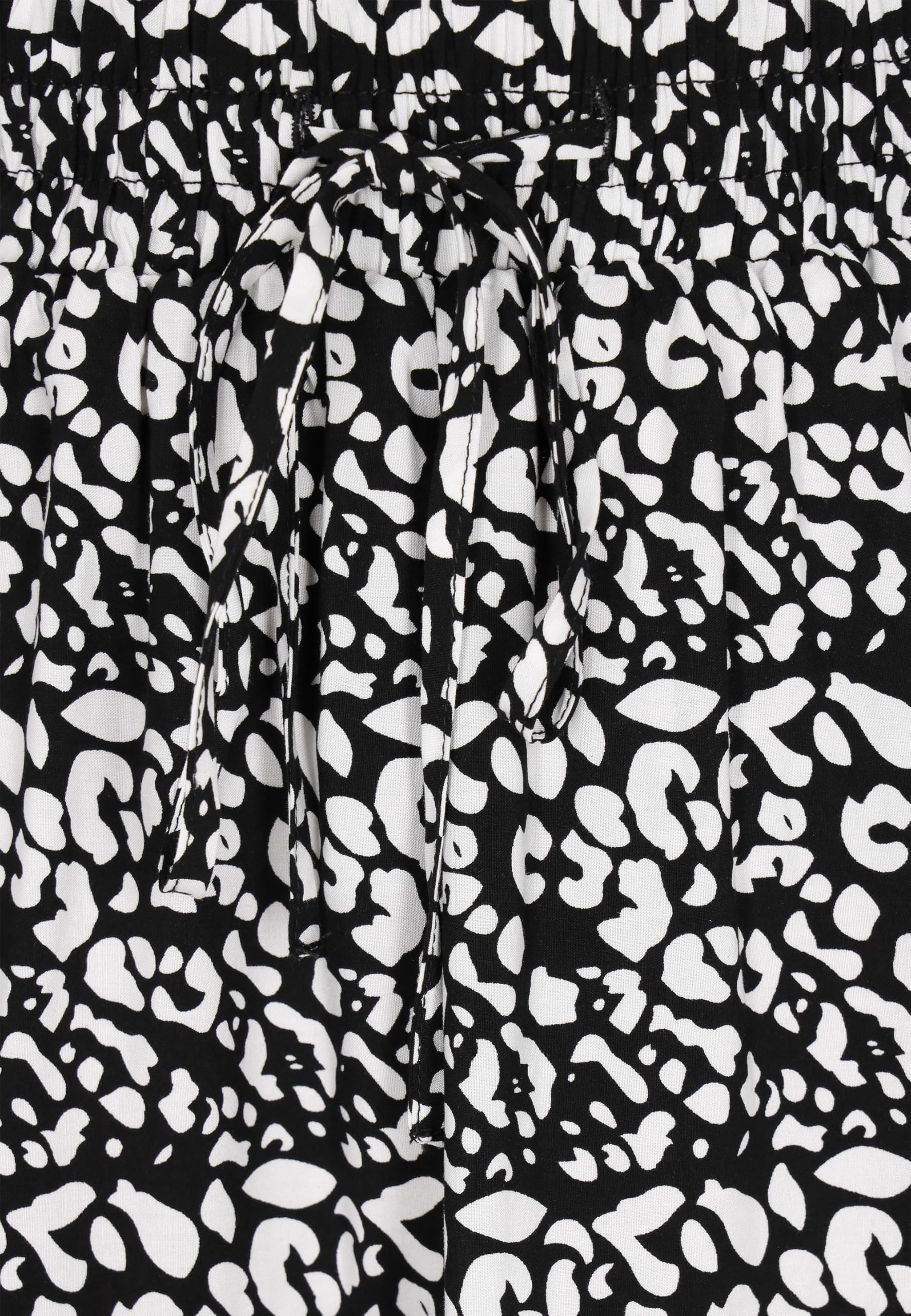 myMo Minifalda para mujer, líneas A, estampado de leopardo, cintura elástica, volantes divertidos, estilo casual moderno