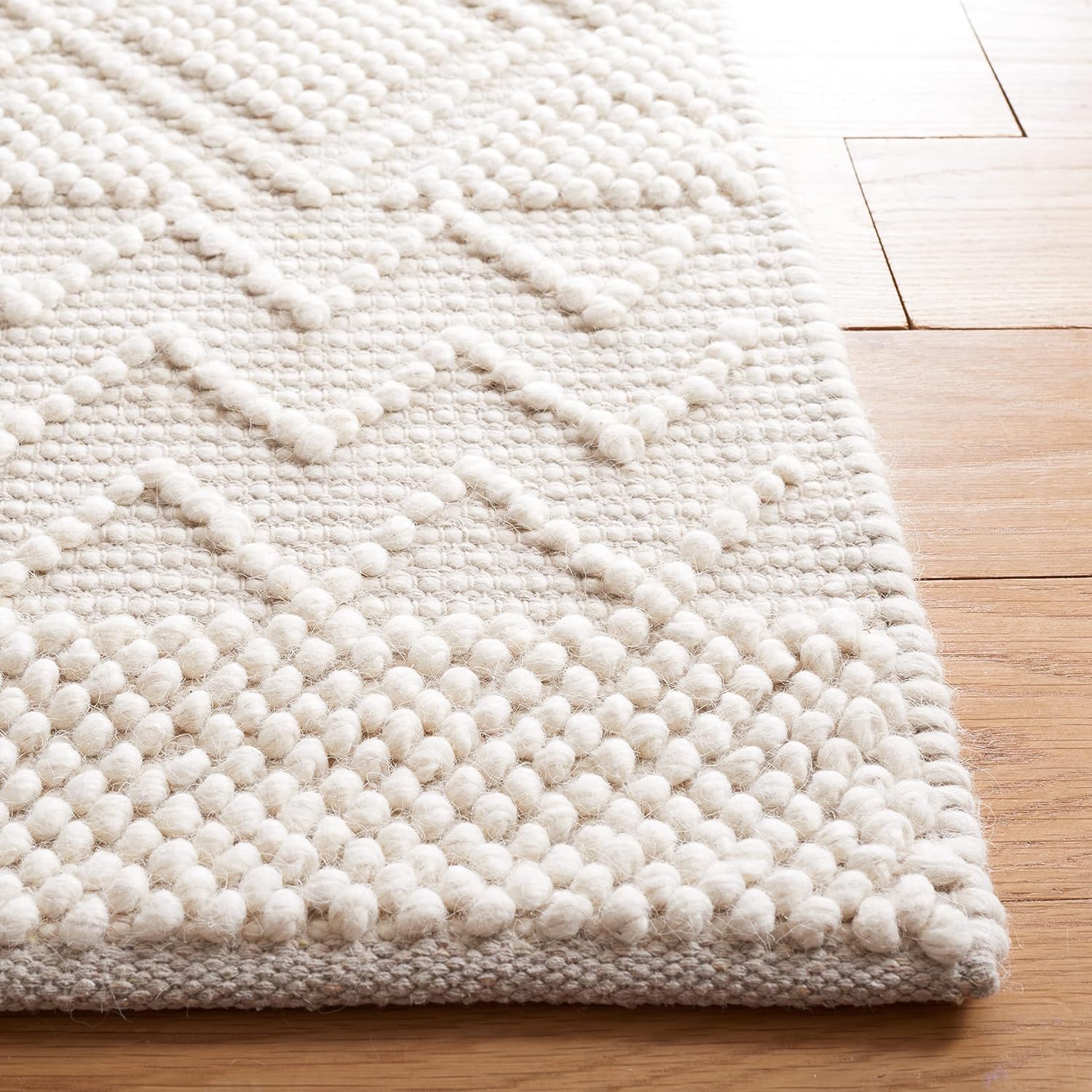 SAFAVIEH Natura Collection Area Rug - 6' x 9', Ivory, Handmade Boho Farmhouse Rustic Wool, Ideal for High Traffic Areas in Living Room, Bedroom (NAT125A)