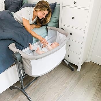 beside the bed bassinet