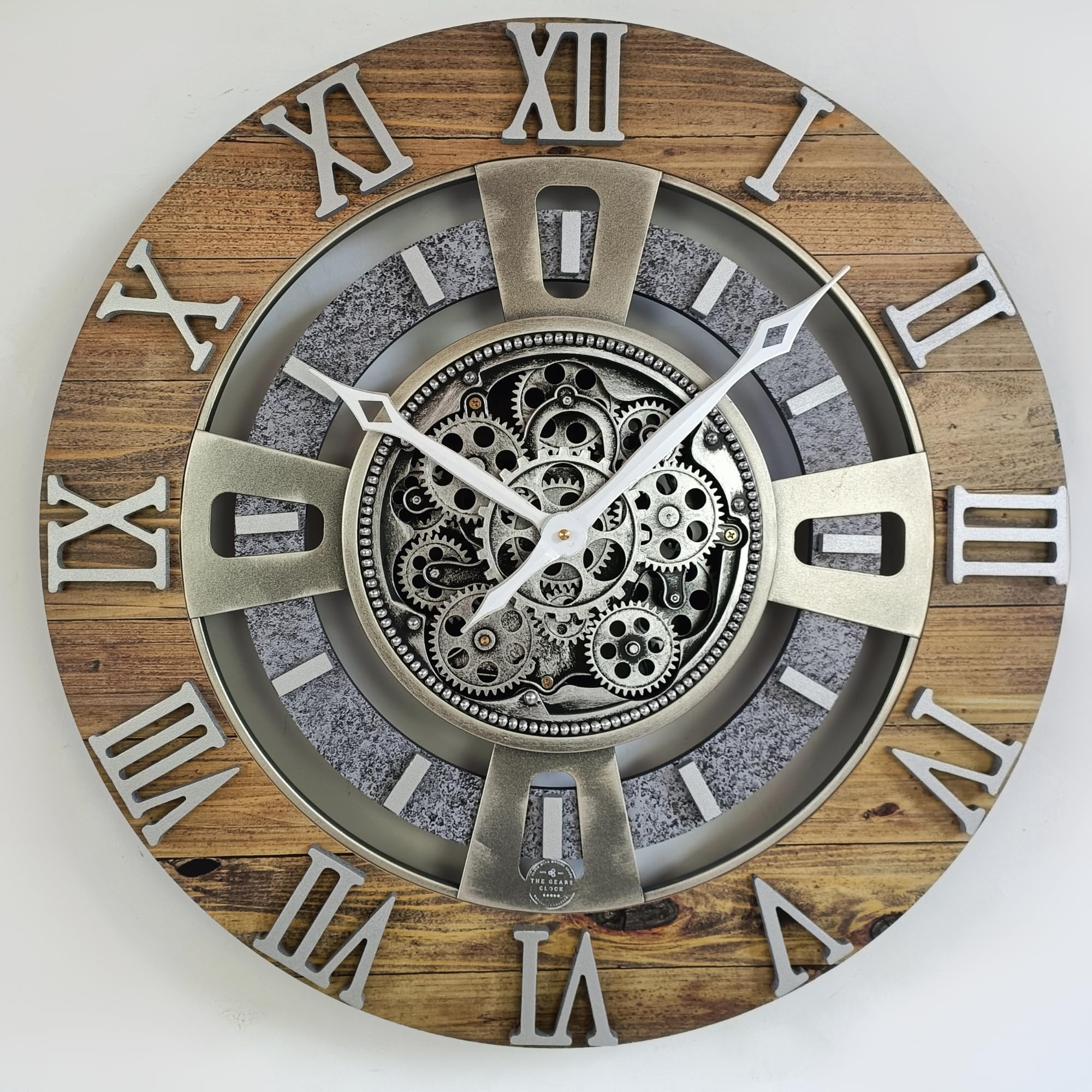 Logo Bugatti en horloge murale sur carosserie bronze | AUTO HORLOGE