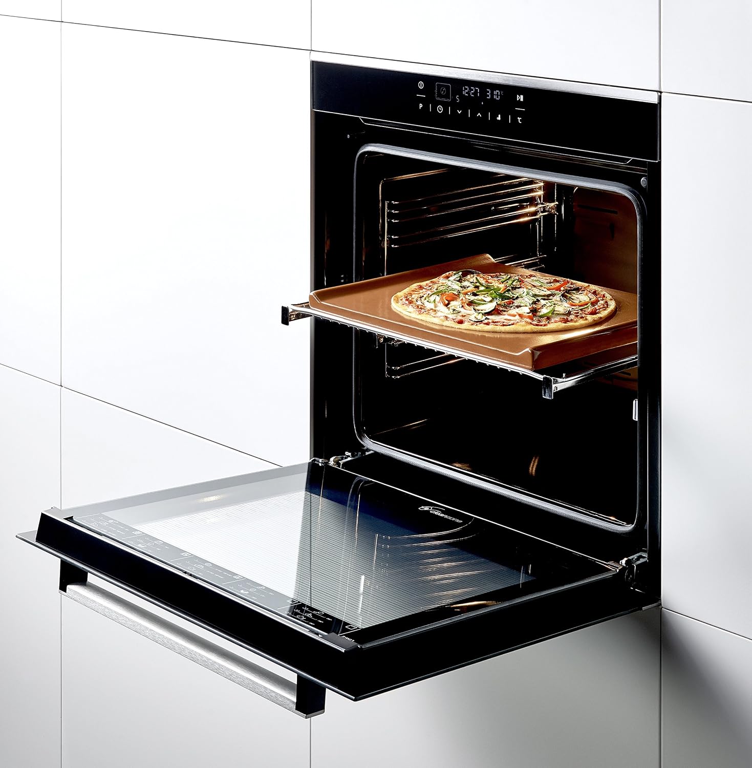 Interior view of the Beko oven with a pizza on a baking tray, showing telescopic rails