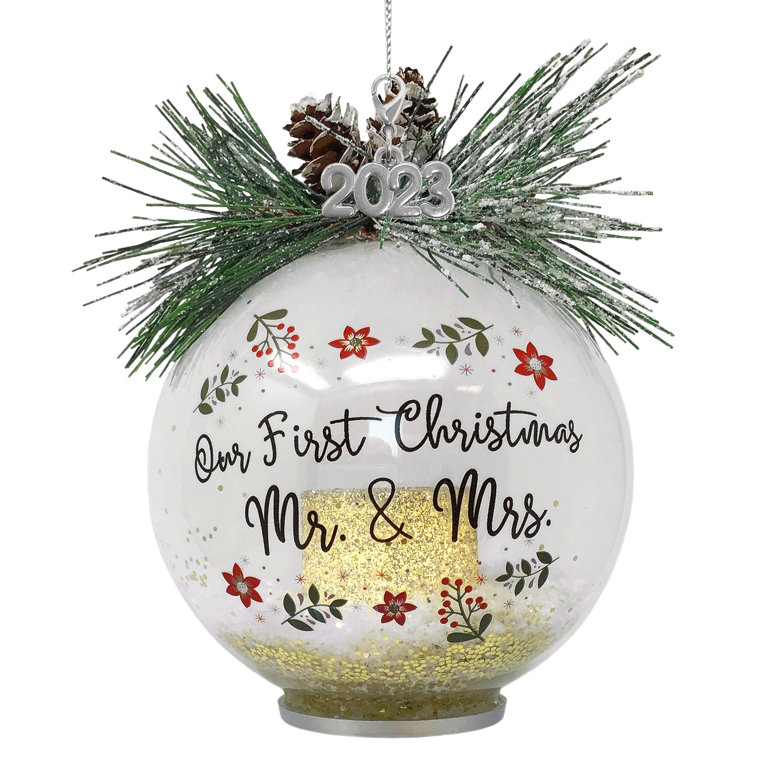 Boule de Noël en verre illuminée avec pommes de pin et bougie votive
