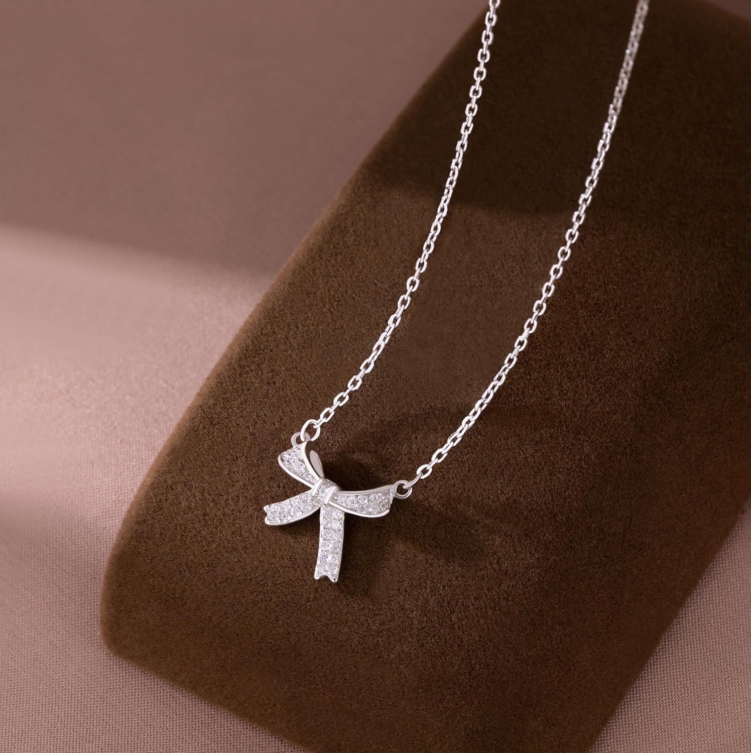 SLUYNZ 925 Sterling Silver Small Bow Choker Necklace for Women Teens CZ Bow Pendant Necklace Chain Bow Ribbon Necklace Mother's Day Gifts - Image 4