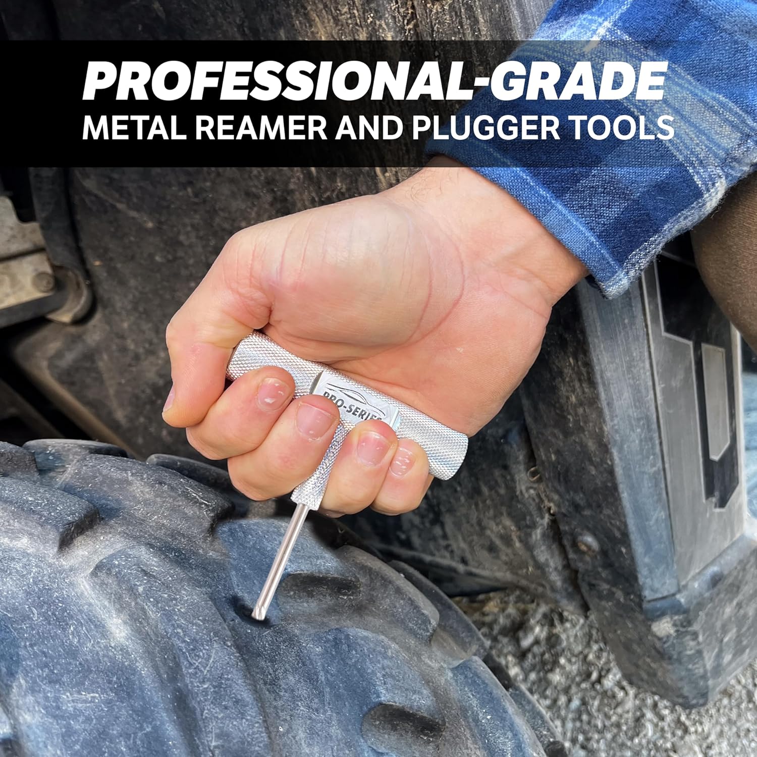 Hand using reamer tool on a tire