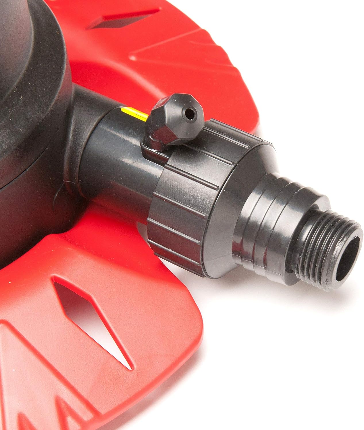 Close-up of pump's discharge port with hose adapter
