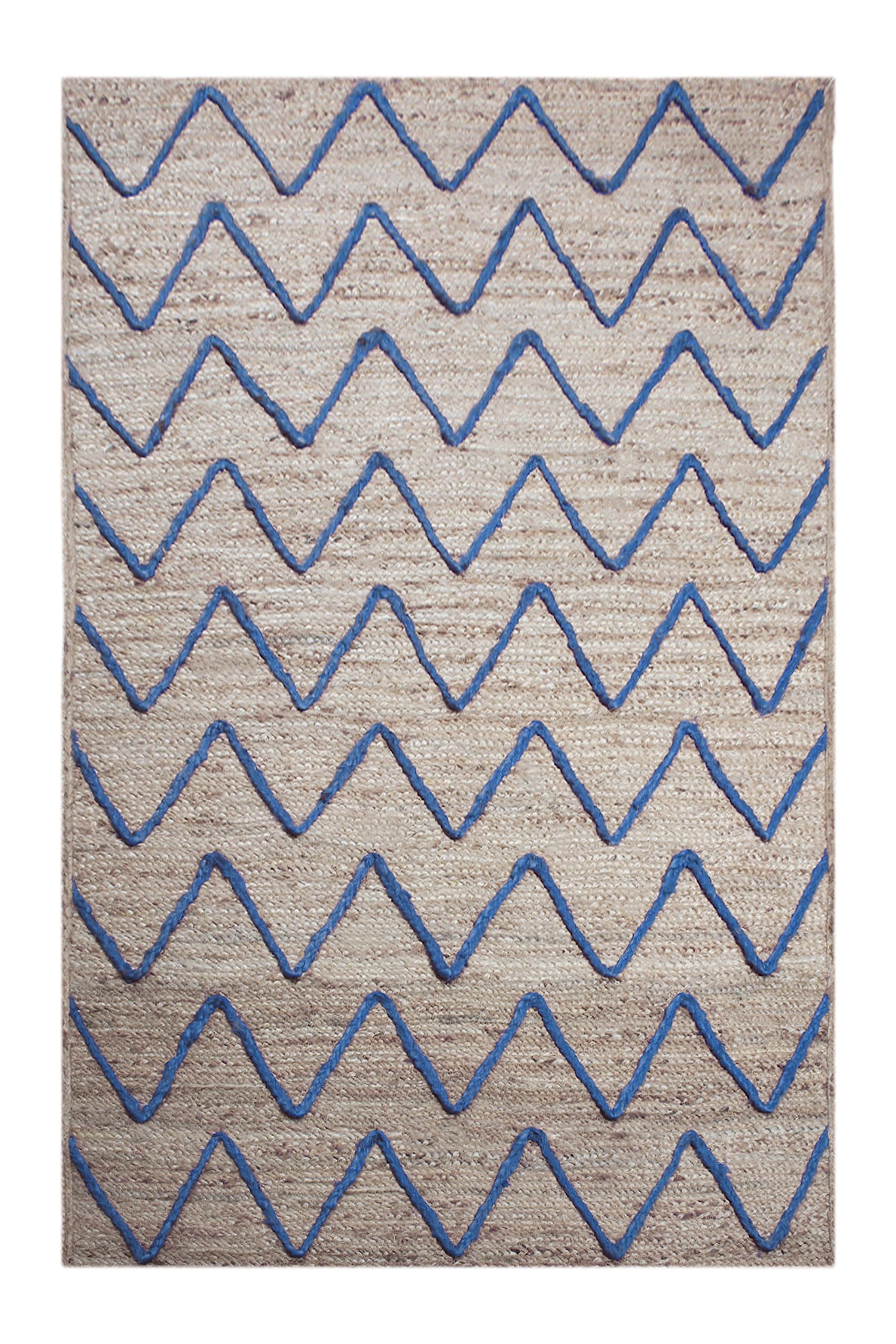Tapis géométrique en jute pour sublimer l'entrée de maison