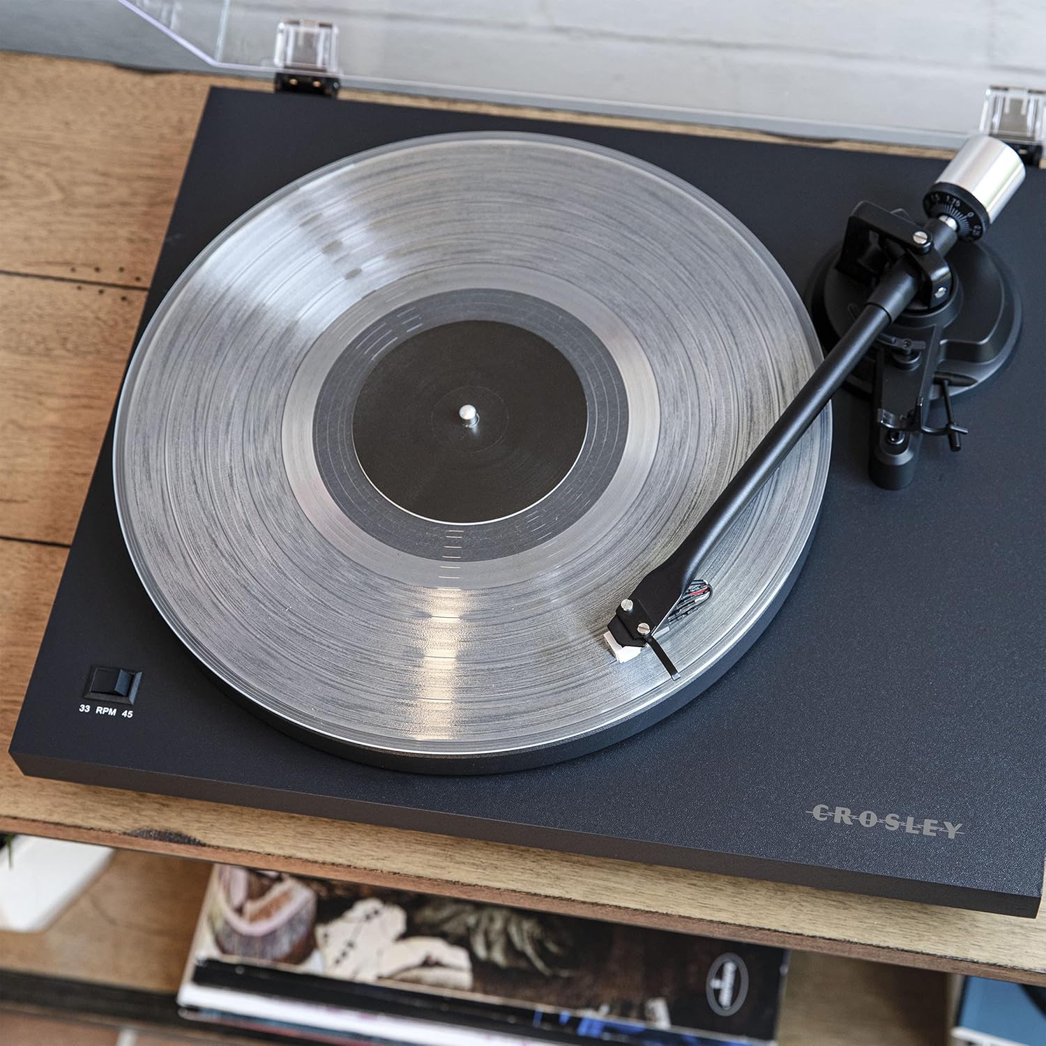 Top-down view of Crosley C6B-DB Turntable platter and tonearm