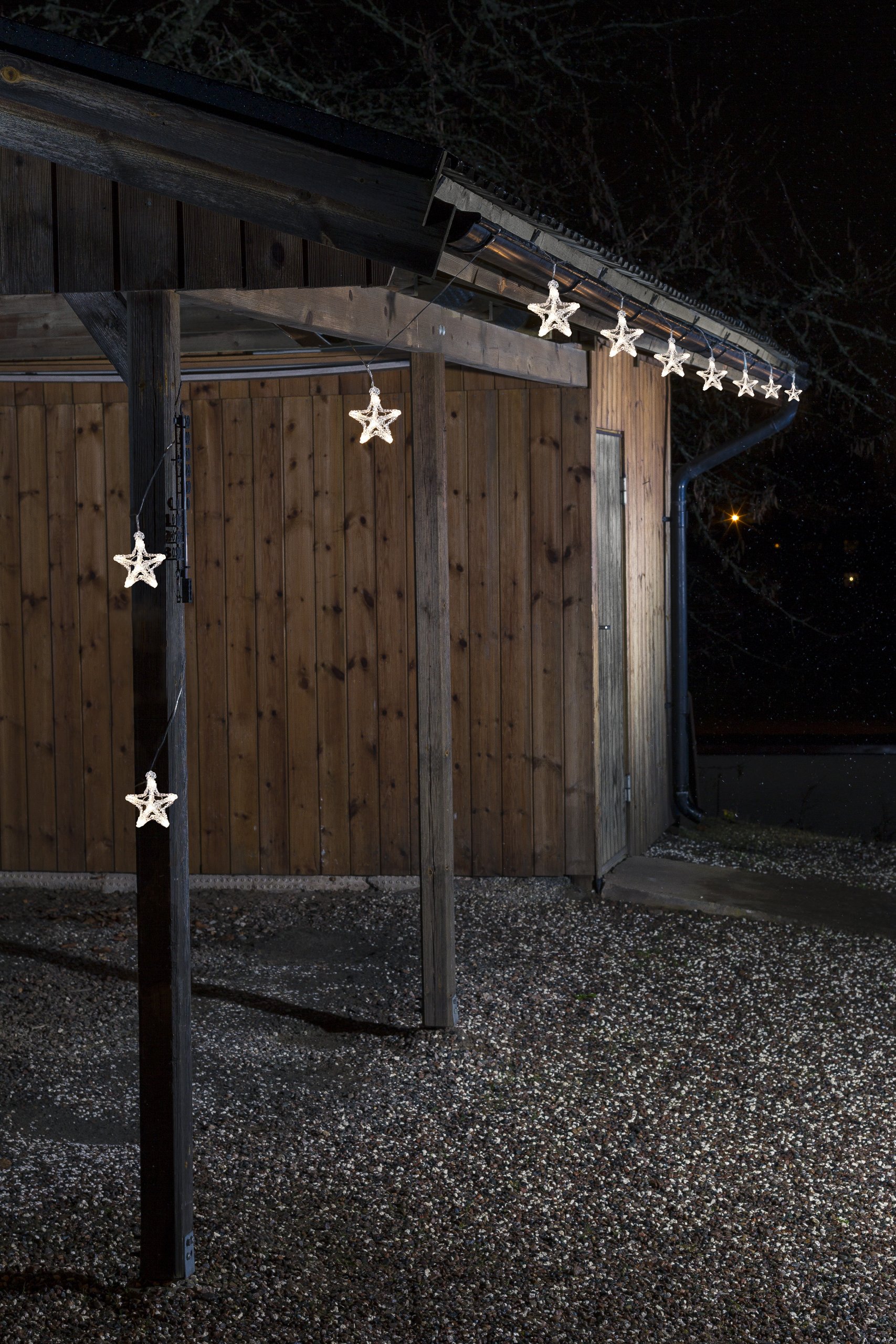 Konstsmide LED Acryl Sternen Lichtervorhang, 10er-Set, 60 warm weiße Dioden, 24V Außentrafo, transparentes Kabel - 4442-103