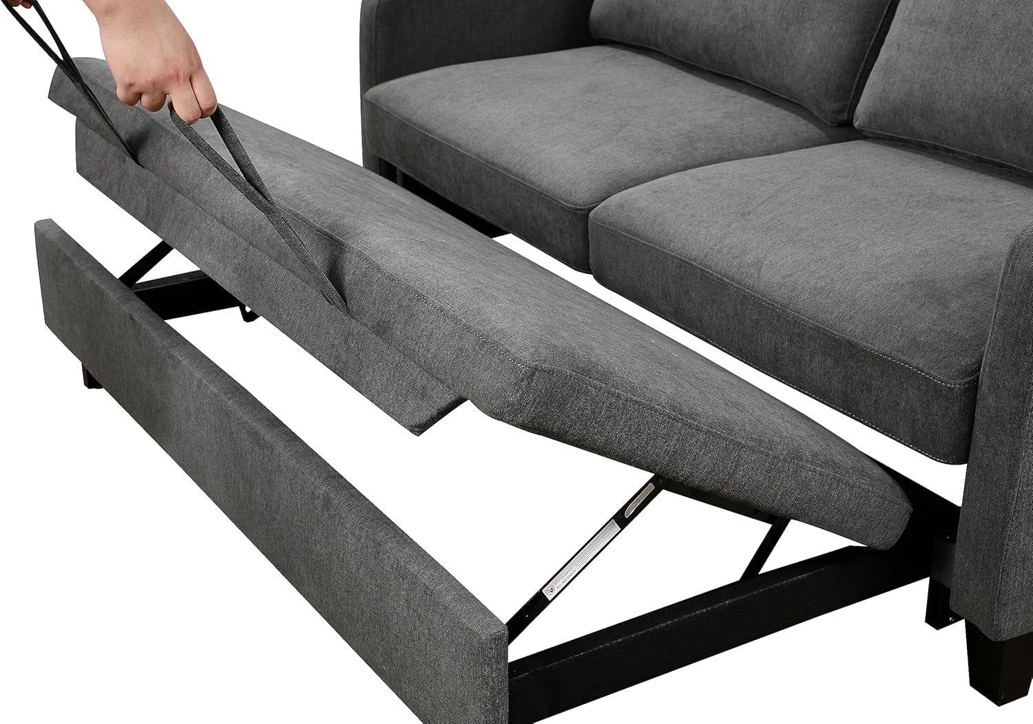 Sofa bed partially extended with the hand still on the strap