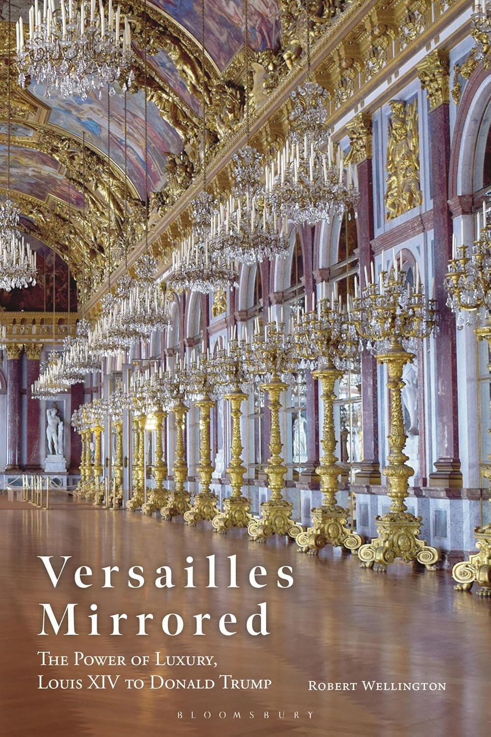 Versailles Mirrored: The Power of Luxury, Louis XIV to Donald Trump      Paperback – October 2, 2025
