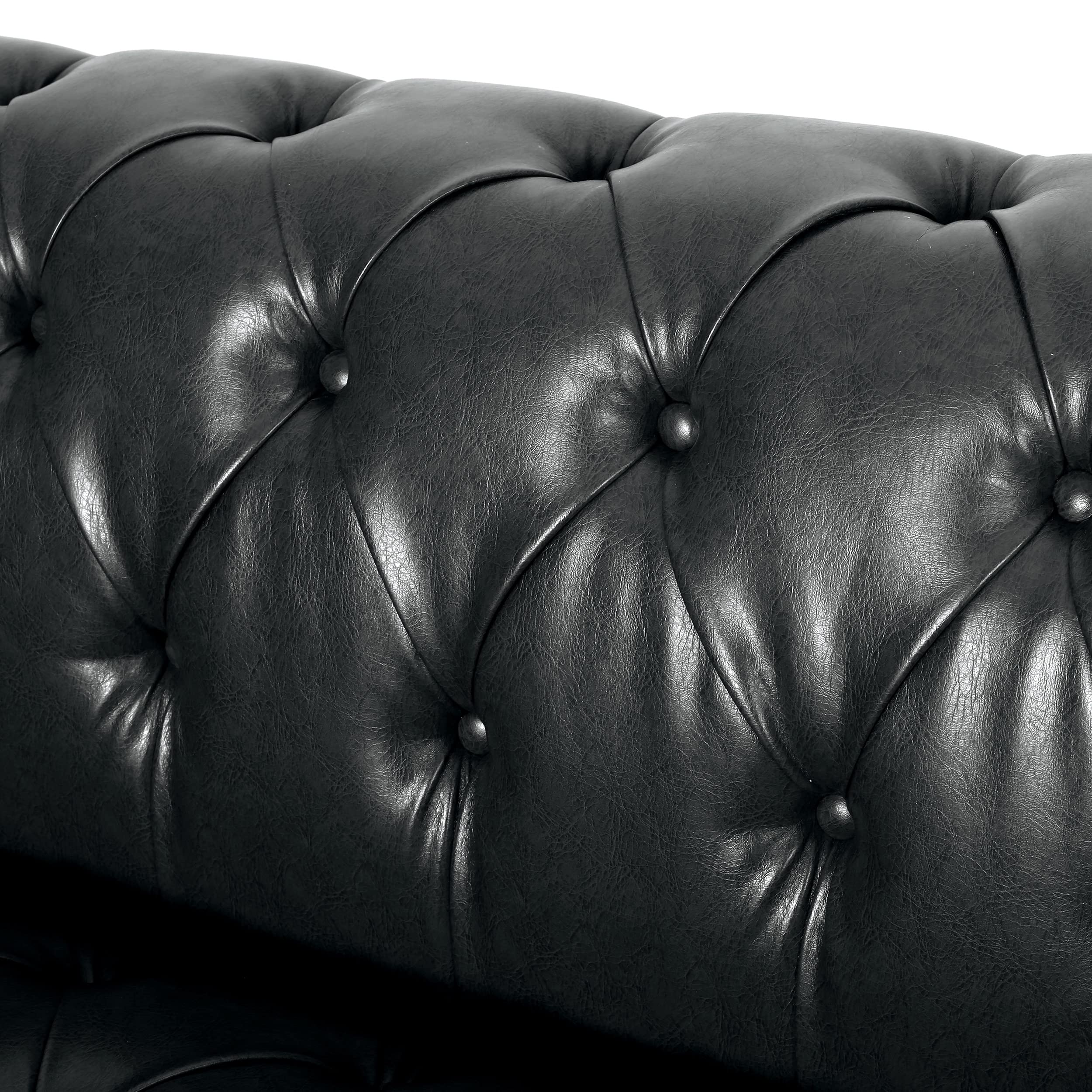 Mid-Century Modern Leather Sofas: 5 Picks Worth Your Room (2026) 1 Christopher Knight Home Sagewood tufted 3-seater faux leather sofa in midnight black - product photo