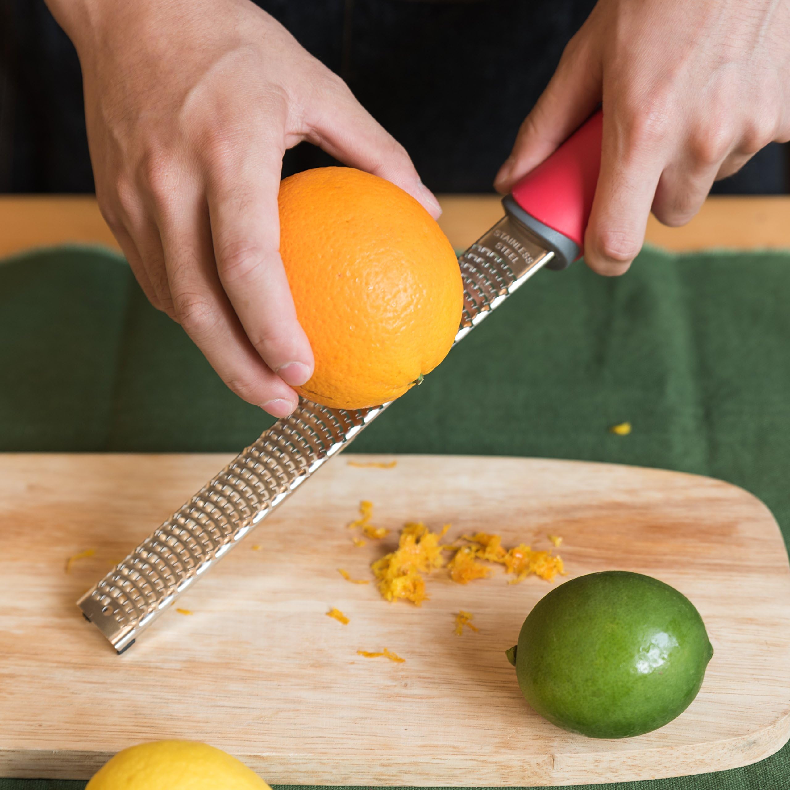 Stainless Steel Zester Grater with Protective Blade Cover- Zest or Grate Cheese, Citrus, Orange, Lemon, Lime, Chocolate, Coconut, Ginger, Garlic, and More in Seconds -Dishwasher Safe