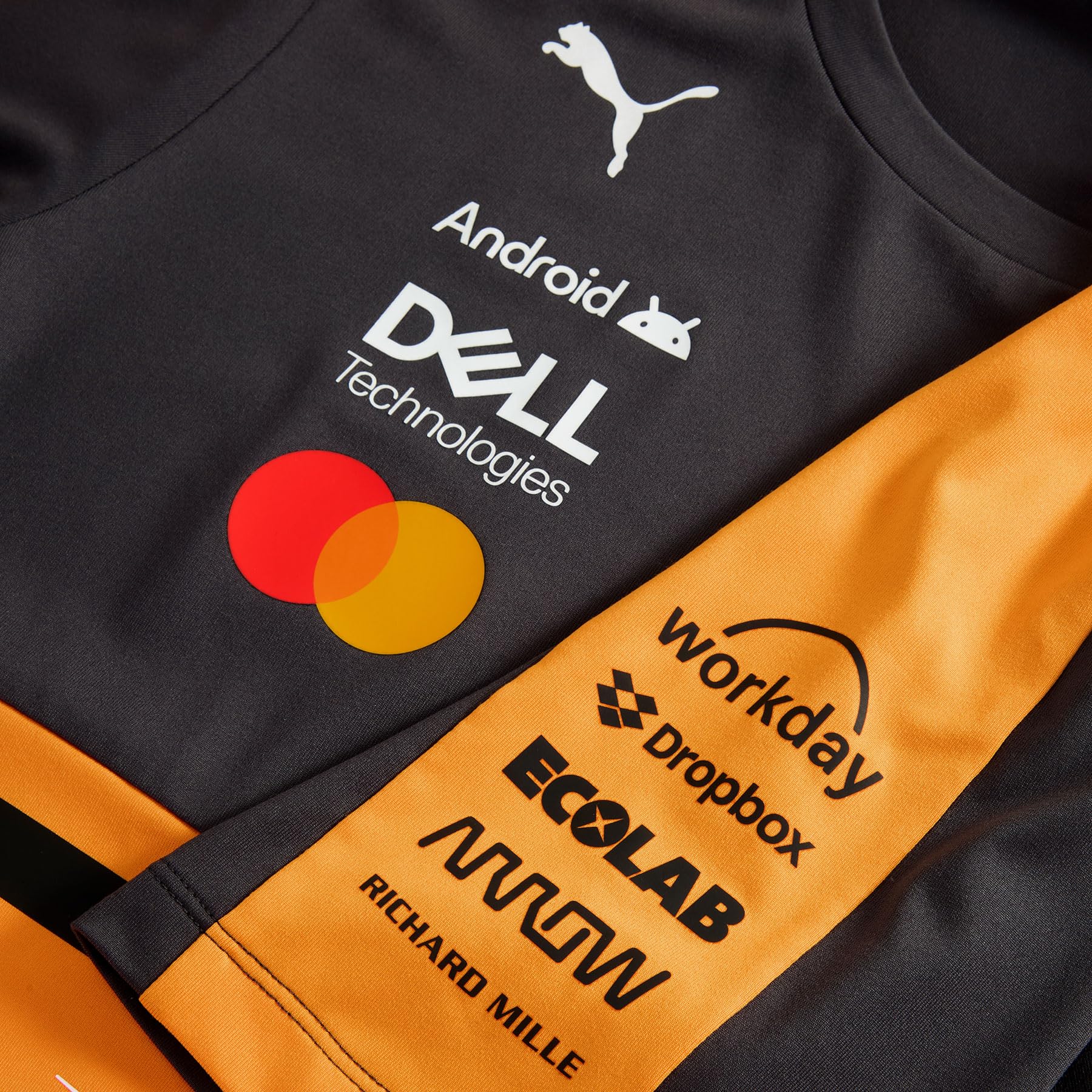 PUMA McLaren F1 2026 Damen Team T-Shirt - Orange | Mit allen neuesten McLaren Formel-1-Team- und Partnerlogos, Offizielle lizenzierte Replica-Sammlung