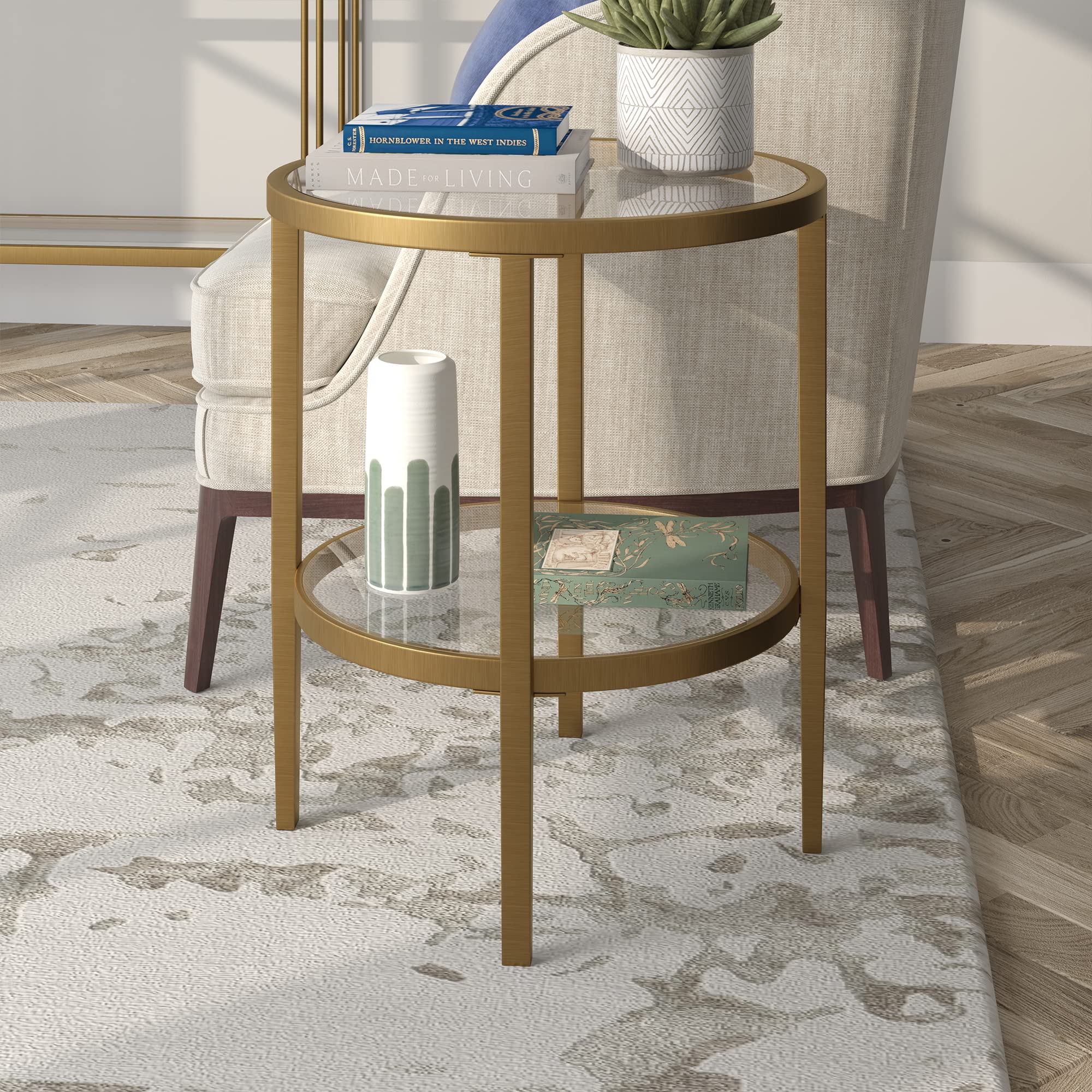 Henn&Hart 20" Wide Round Side Table with Glass Shelf in Antique Brass, Table for Living Room, Bedroom | Glass shelves add airy display space and modern glam style beside sofas, beds, or accent chairs