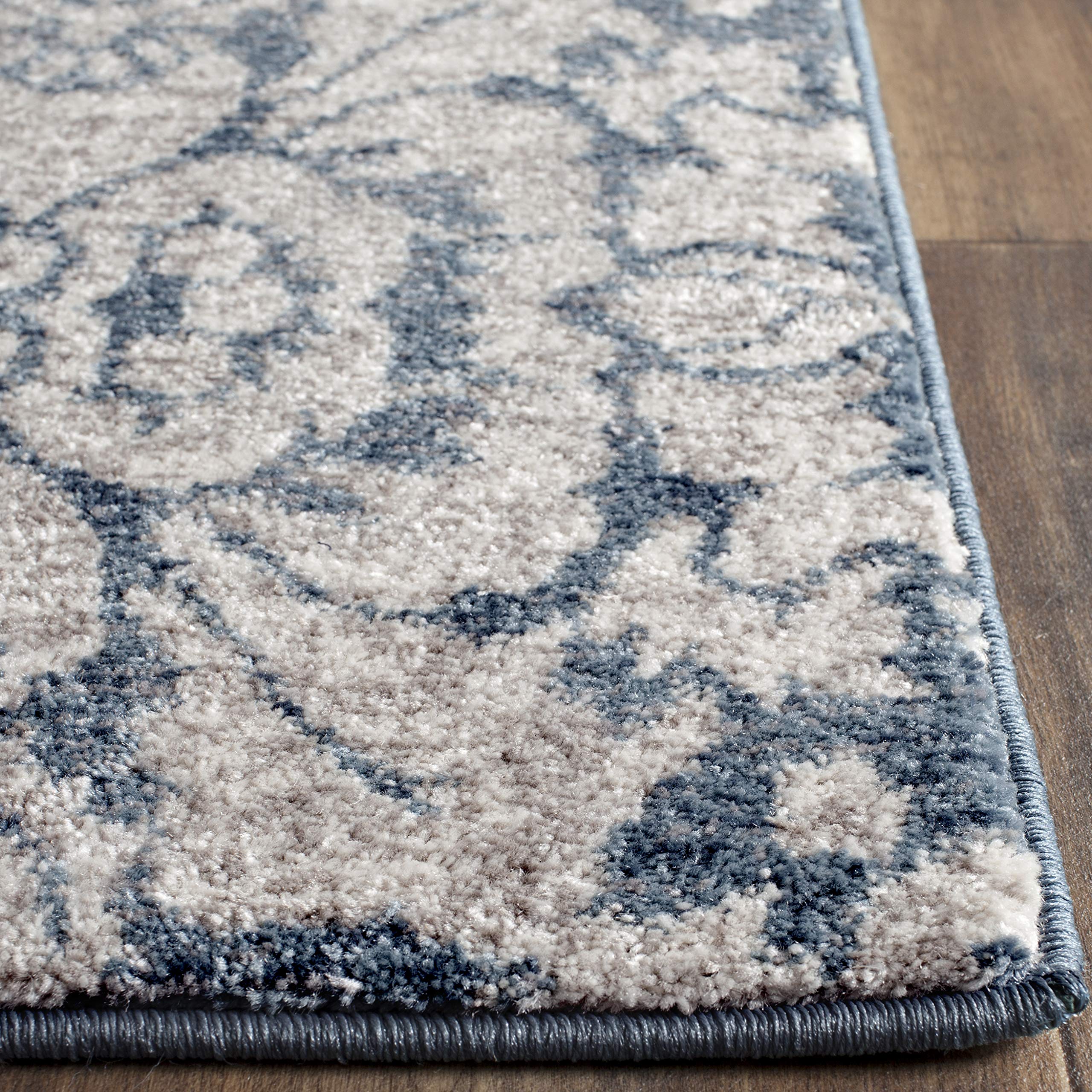 SAFAVIEH Tapis Traditionnel Pour Salon, Salle à manger, Chambre à coucher - Sofia Collection, Tapis à poil court, Bleu et beige, 122 X 170 cm