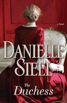 This cover for Danielle Steel's The Duchess features the profile of a woman from behind as she sits in a Victorian room. She is wearing a Victorian long red dress with white lace. Her hair is blonde and up in a bun.