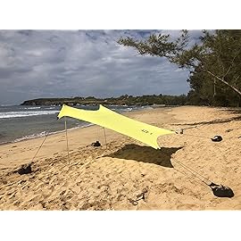 Neso Portable Beach Tent Sun Shelter with Sand Anchor - Lightweight Beach Shade Canopy - Easy Setup for Family Outings - Patented Reinforced Corners - UPF 50+ Sun Protection - 7 x 7ft - Lemon