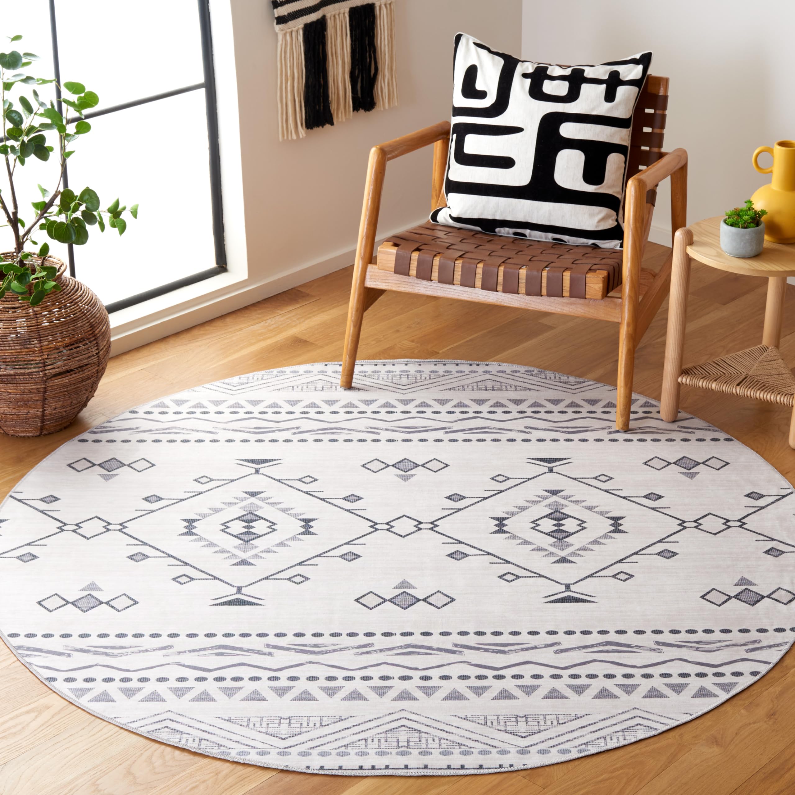 Tapis abstrait ivoire et noir pour salon dynamique Safavieh 183x183