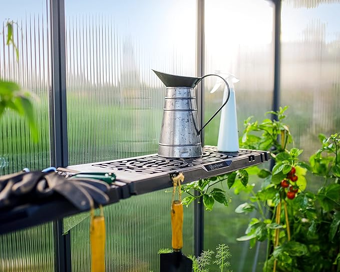 Crafted from easy-to-clean polypropylene, this shelf kit is both durable and functional. The material is designed to withstand the rigors of greenhouse environments, with holes for drainage to keep your plants healthy and thriving. The kit includes 2 shelves and all necessary hardware for easy assembly, as well as notches for hanging garden tools. For added versatility, grooves underneath the shelves allow for the addition of Palram – Canopia hanging clips (sold separately), maximizing your storage options.
