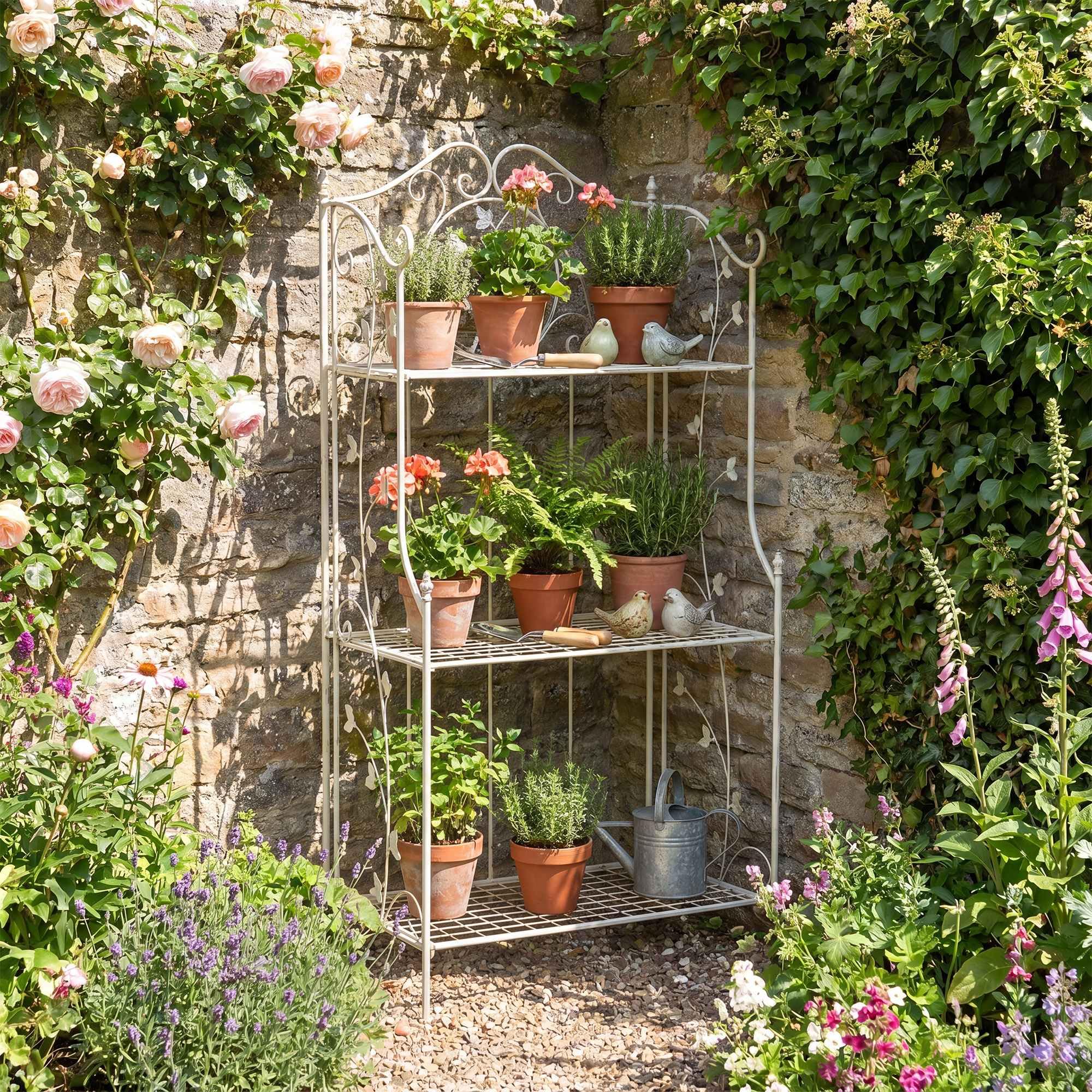 CLP Estanteria de pie Plegable Reus, Estante Escalonado Estilo Rustico, estanteria para Plantas de Metal, compacta para Interior y Exterior, Color:Blanco Envejecido