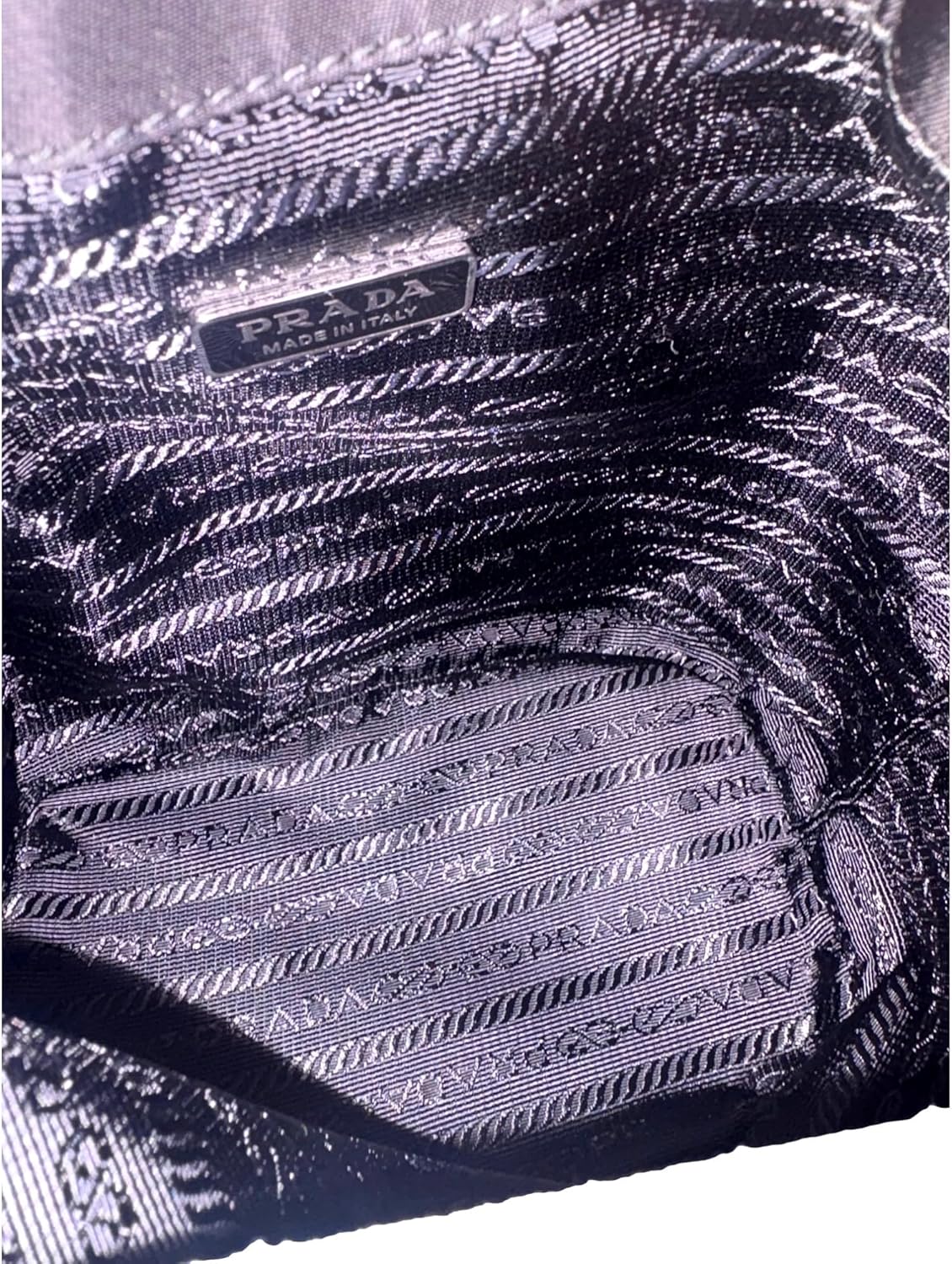 Prada Re-Nylon Black Tassel Drawstring Bucket Bag with Leather Top Handle and Detachable Strap, Silver Hardware, Made in Italy