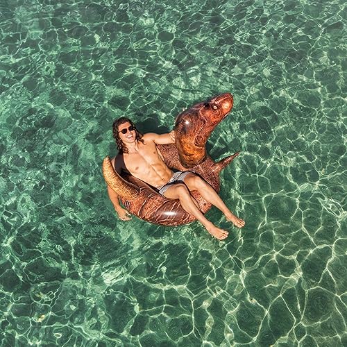 Miniatura 5 de PoolCandy - Tubo inflable de dinosaurio T-Rex de 42 pulgadas de ancho. Perfecto para cualquier ocasión, este dinosaurio prehistórico está listo para