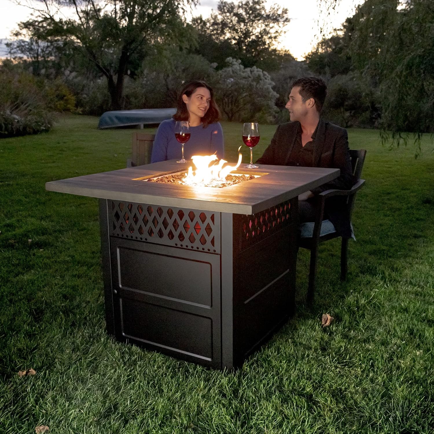 Hidden propane tank compartment in the fire pit base
