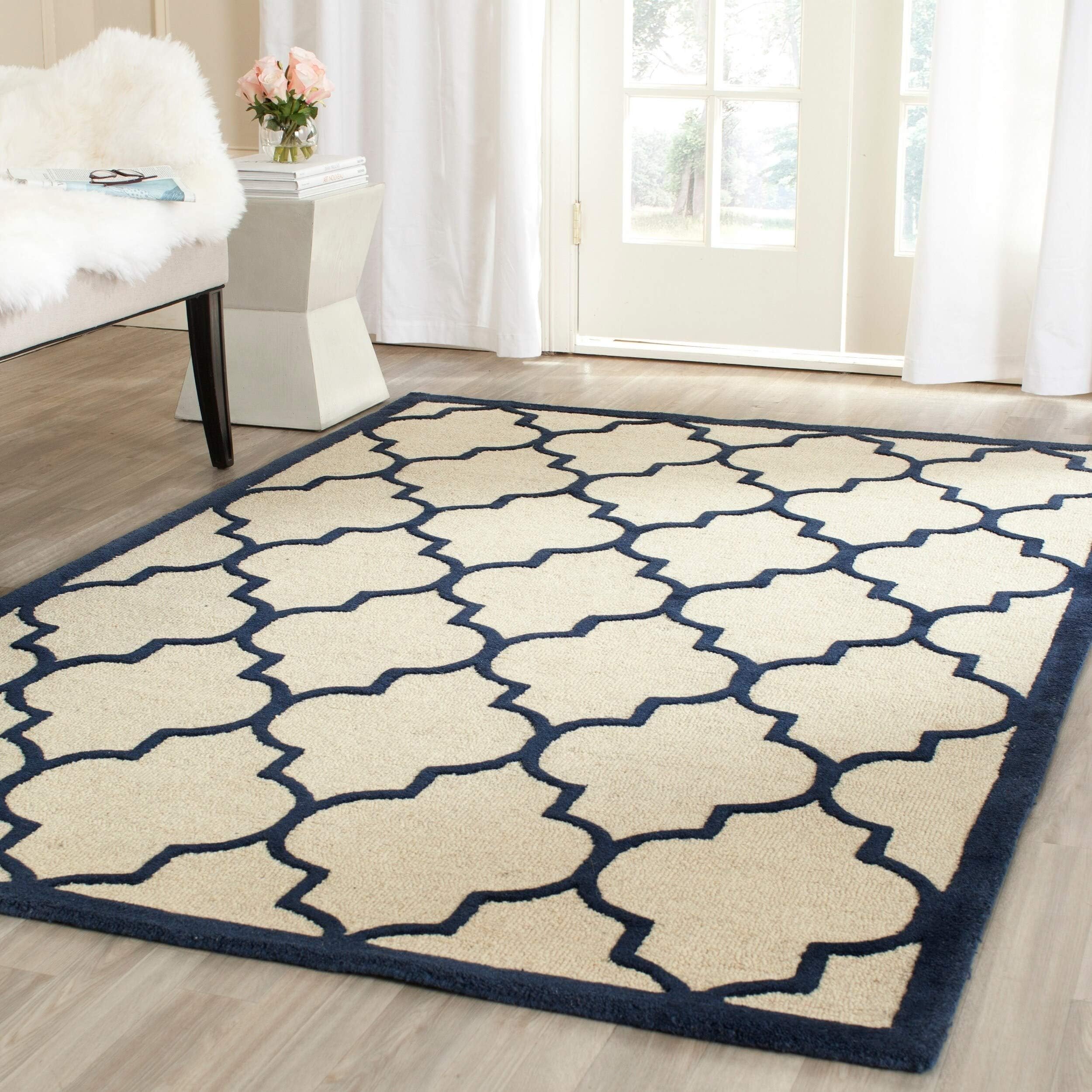 SAFAVIEH Cambridge Collection Area Rug - 9' x 12', Ivory & Navy, Handmade Moroccan Trellis Wool, Ideal for High Traffic Areas in Living Room, Bedroom (CAM134Z)