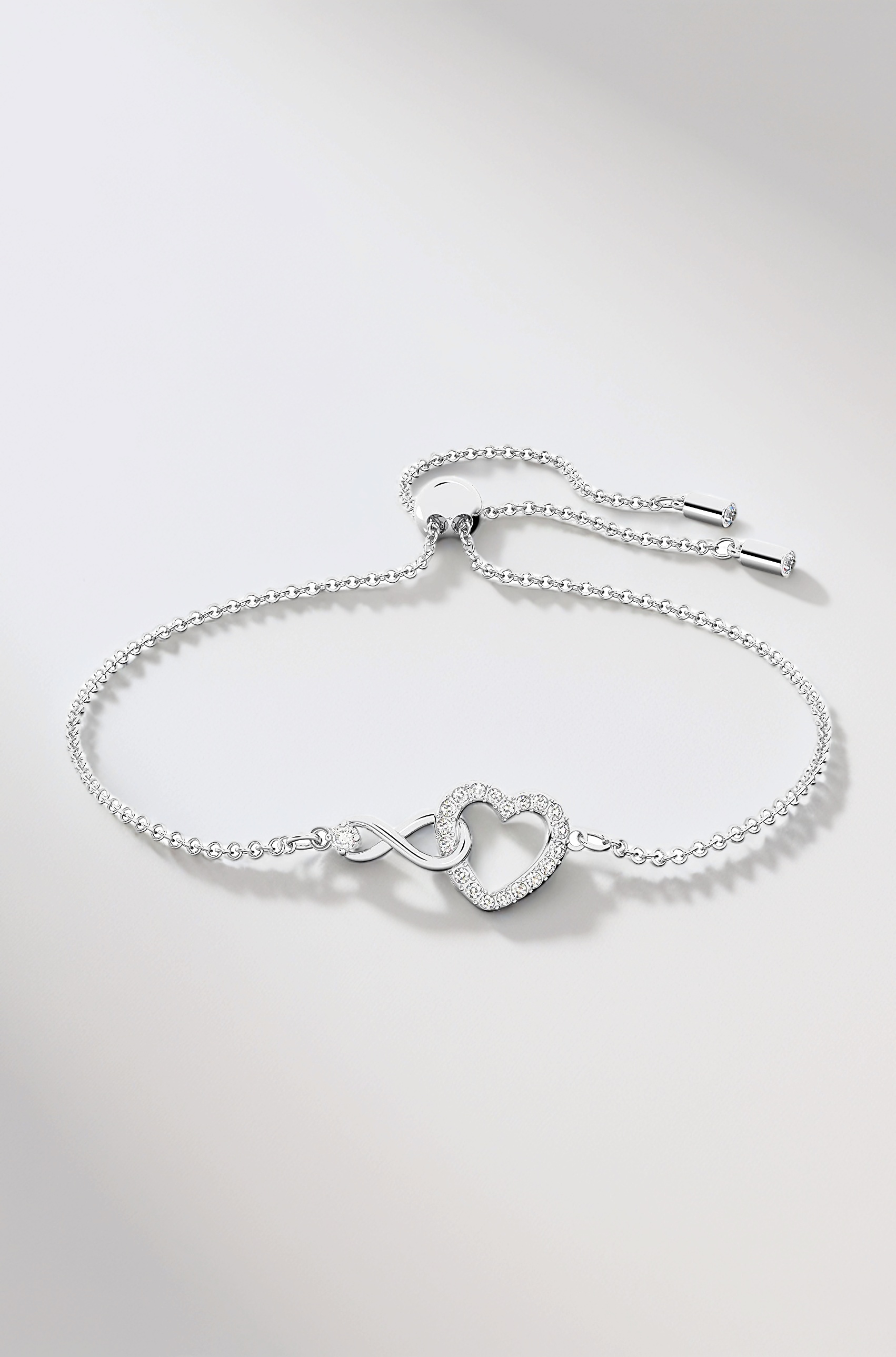 Swarovski Hyperbola bracelet, Infinity and heart, White, Rhodium plated