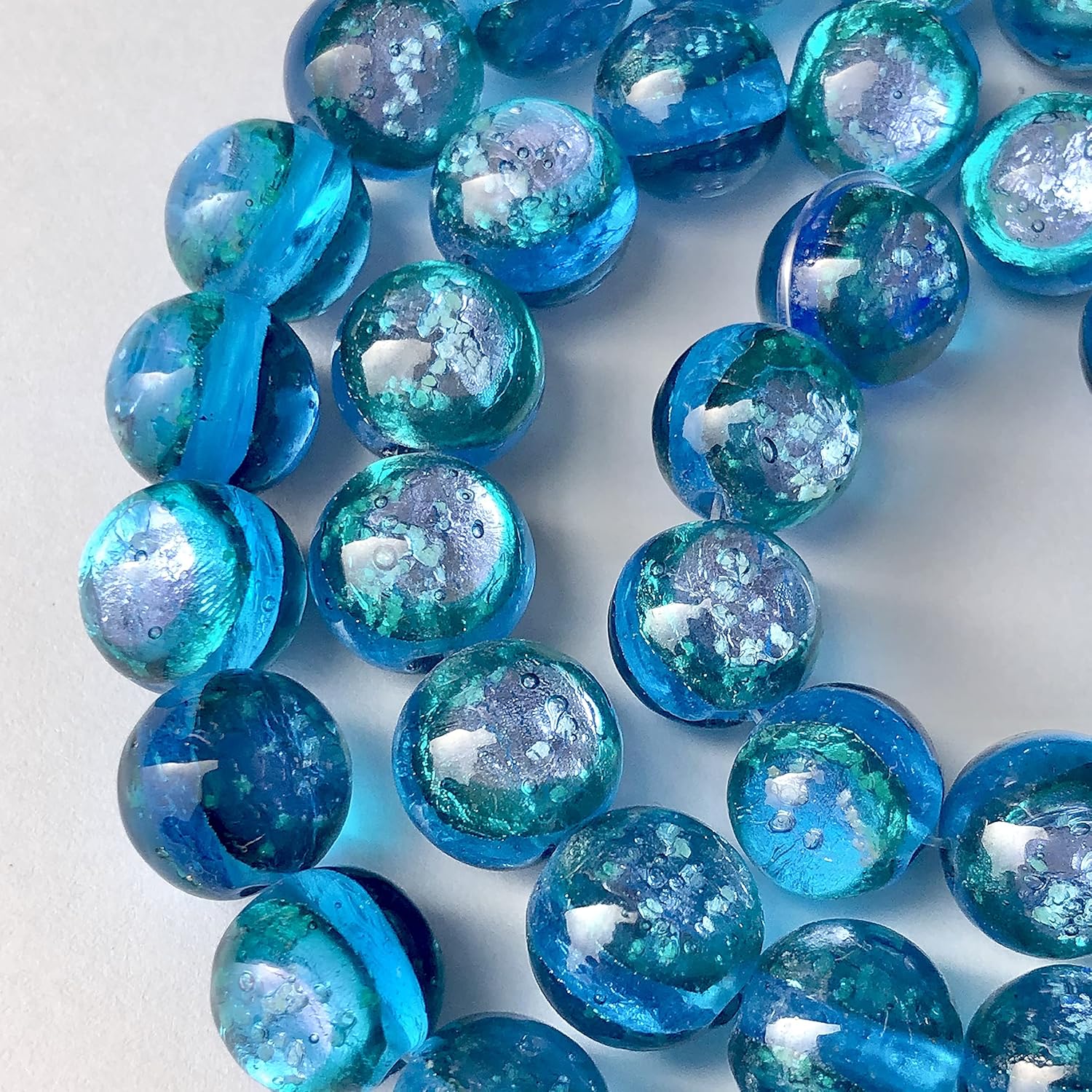 コウリブルー 12mm 連売り 蓄光 ホタルガラス 沖縄とんぼ玉 古宇利島