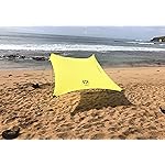 Neso Portable Beach Tent Sun Shelter with Sand Anchor - Lightweight Beach Shade Canopy - Easy Setup for Family Outings - Patented Reinforced Corners - UPF 50+ Sun Protection - 7 x 7ft - Lemon