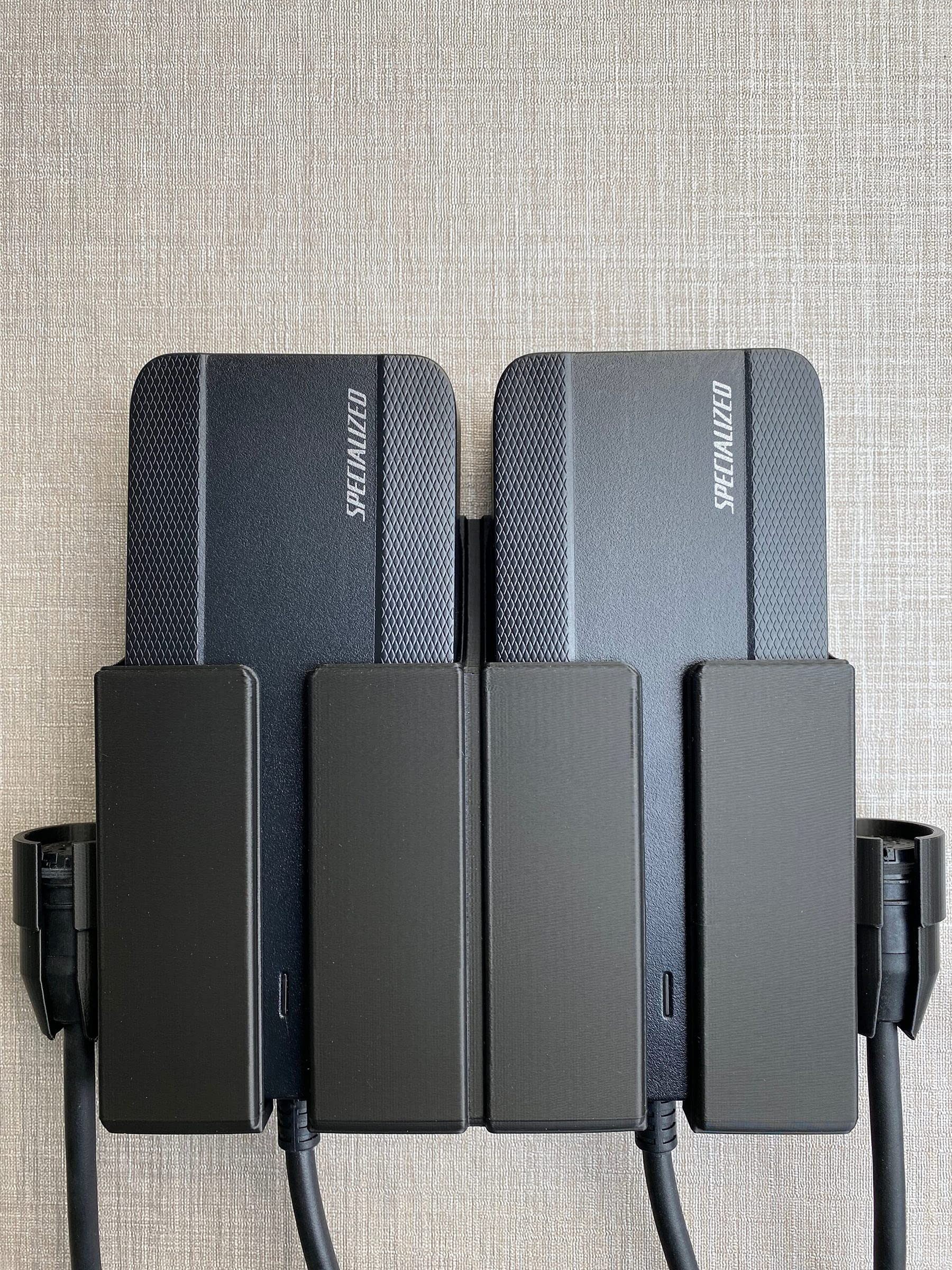Soporte de pared para el cargador Giant Smart Charger de tipo L para bicicleta eléctrica.
