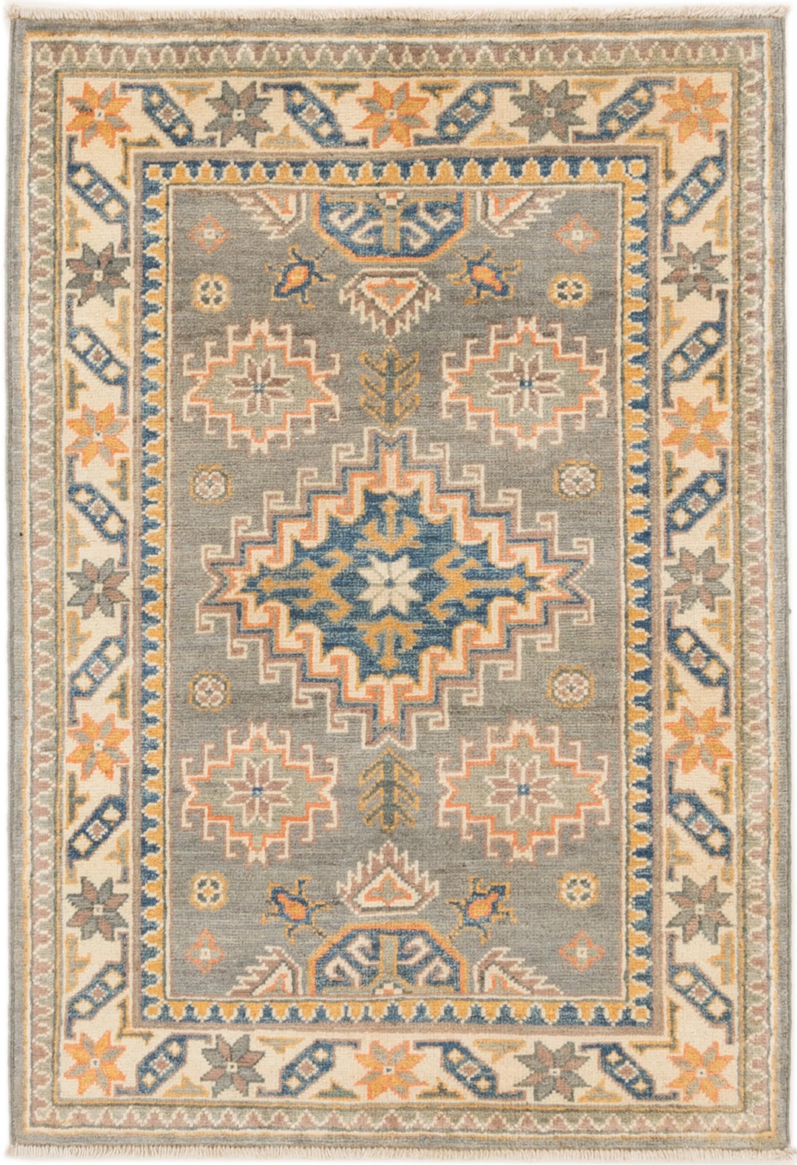 Tapis Kazak noué main 80x119, l'histoire d'un tapis d'Orient en laine