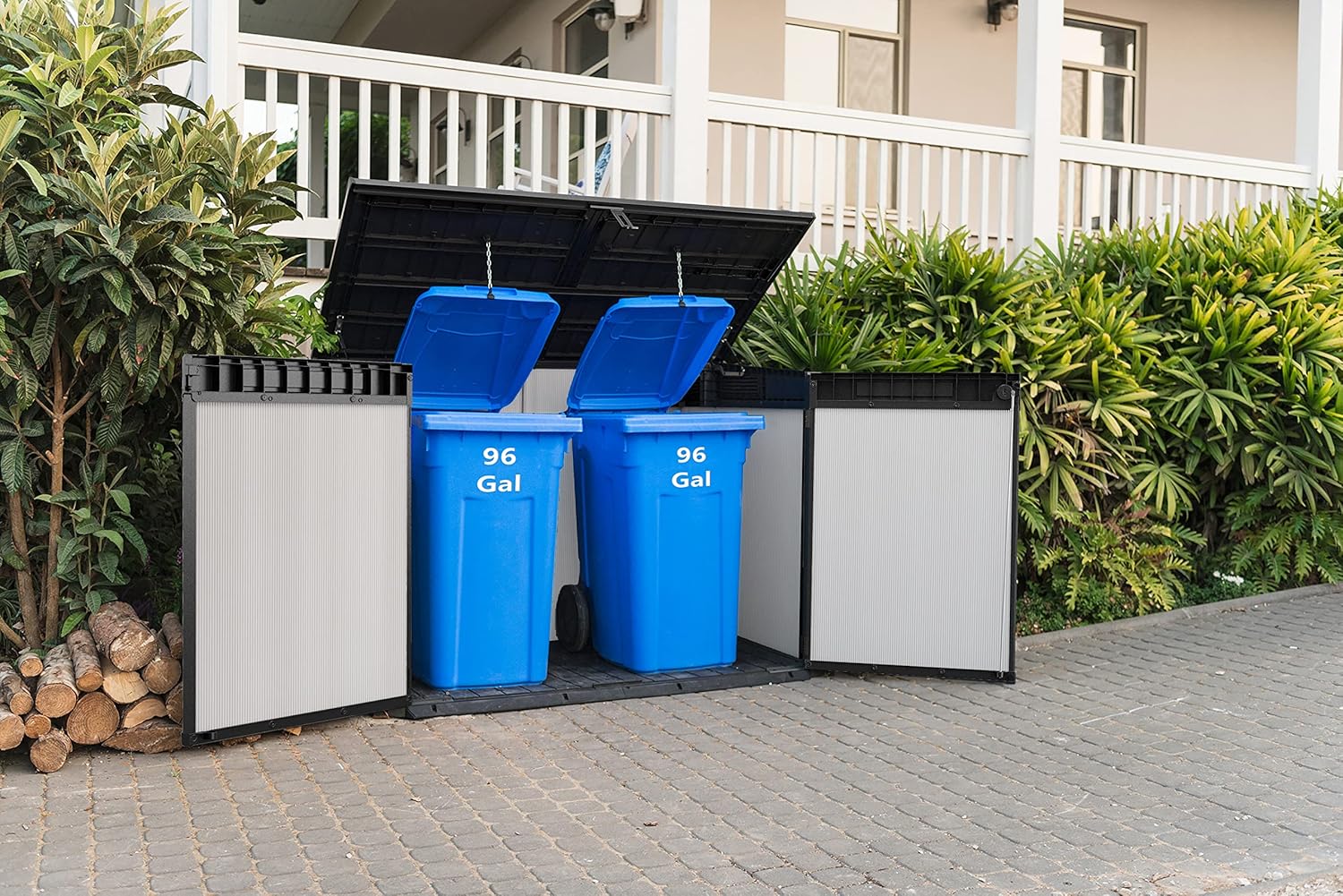 Keter Premier Jumbo Storage Shed with lid open, showing two 96-gallon trash cans.
