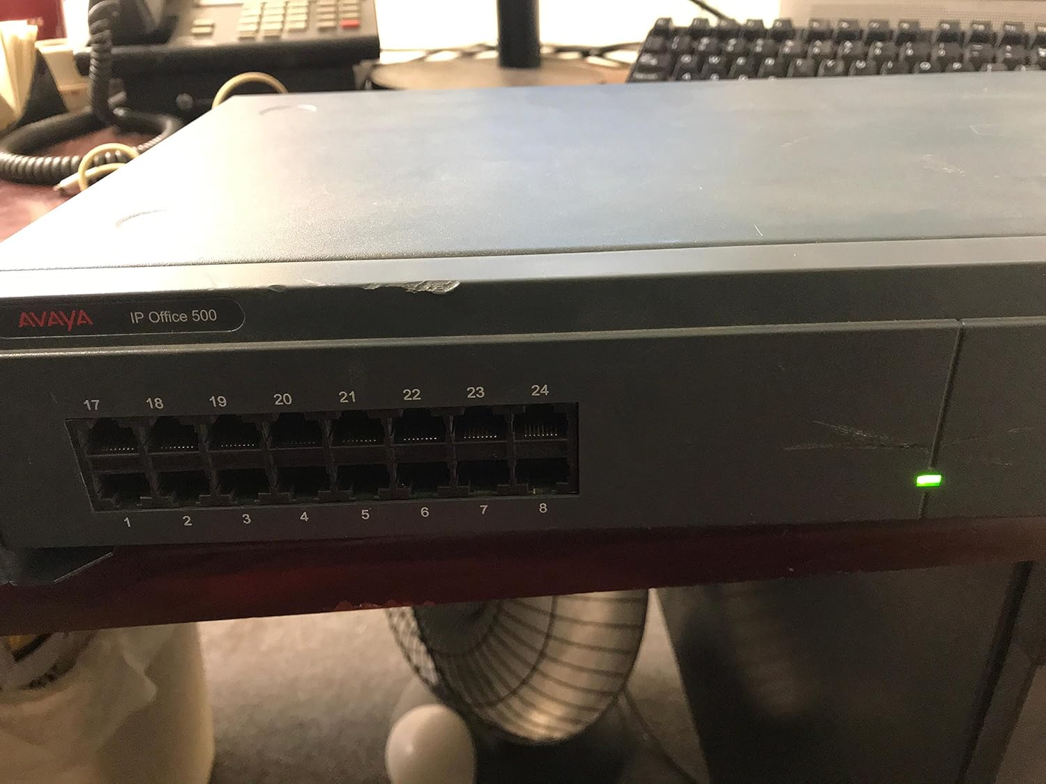 Avaya IP Office 500 EXP MOD Phone 30 Module with green status light illuminated