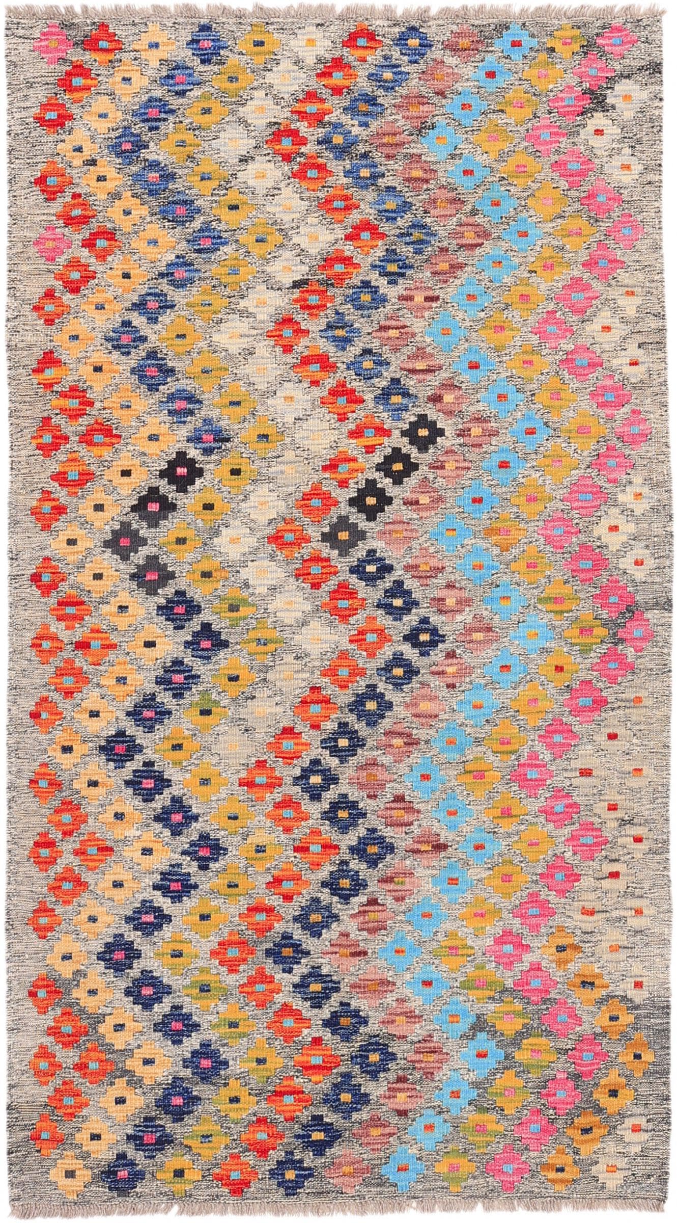 Tapis Kilim afghan en laine pour raviver un sol froid et impersonnel
