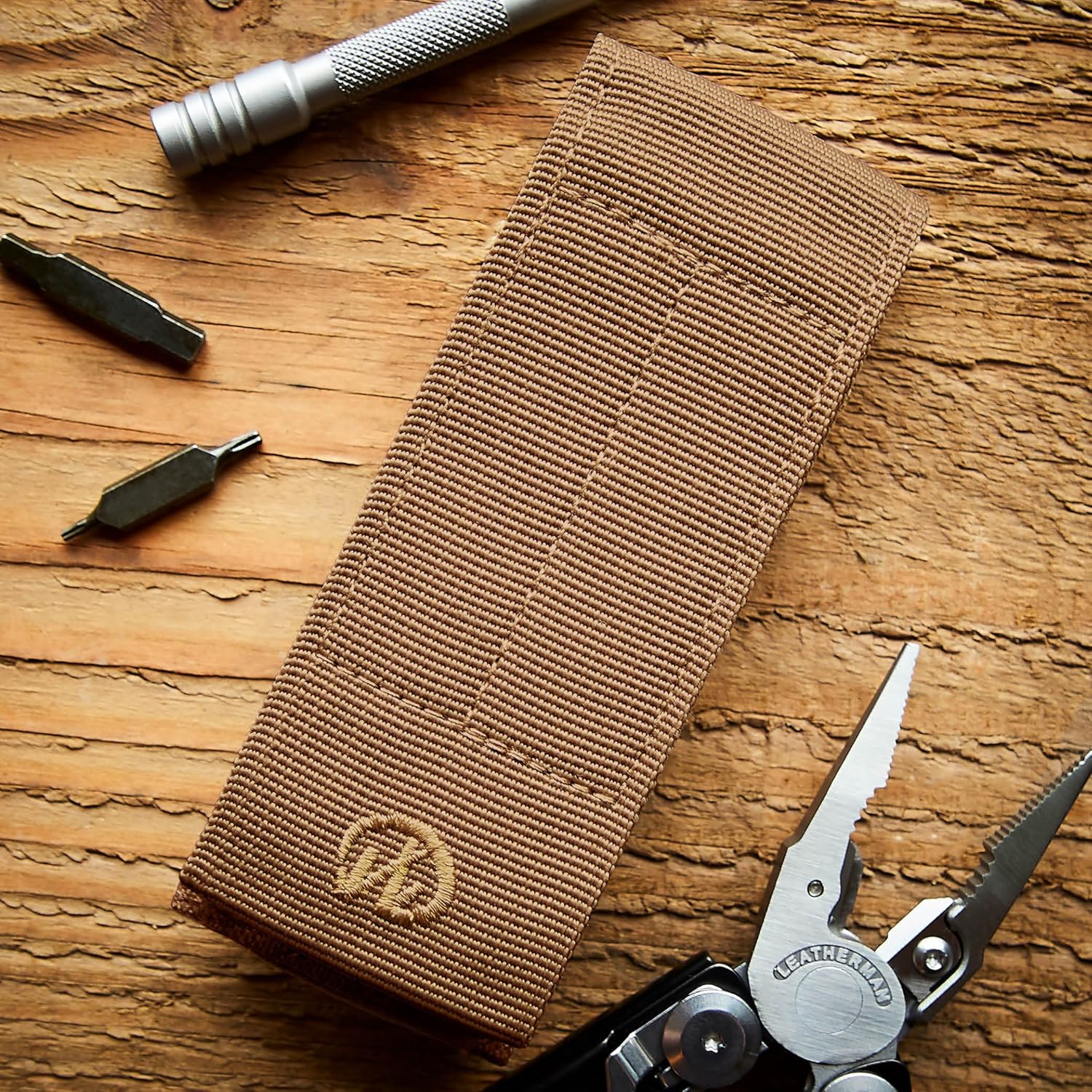 LEATHERMAN, MOLLE Compatible Large Nylon Sheath with Pockets for Multitools, Made in the USA, Fits 4" and 4.5" Tools, Brown - - 