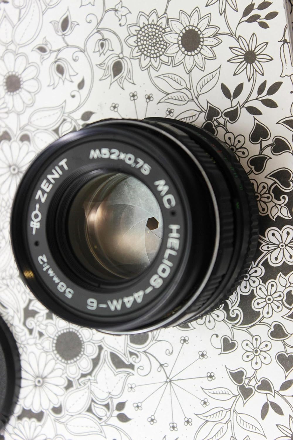 Davant view of the Helios 44M-6 lens showing the aperture and focusing rings