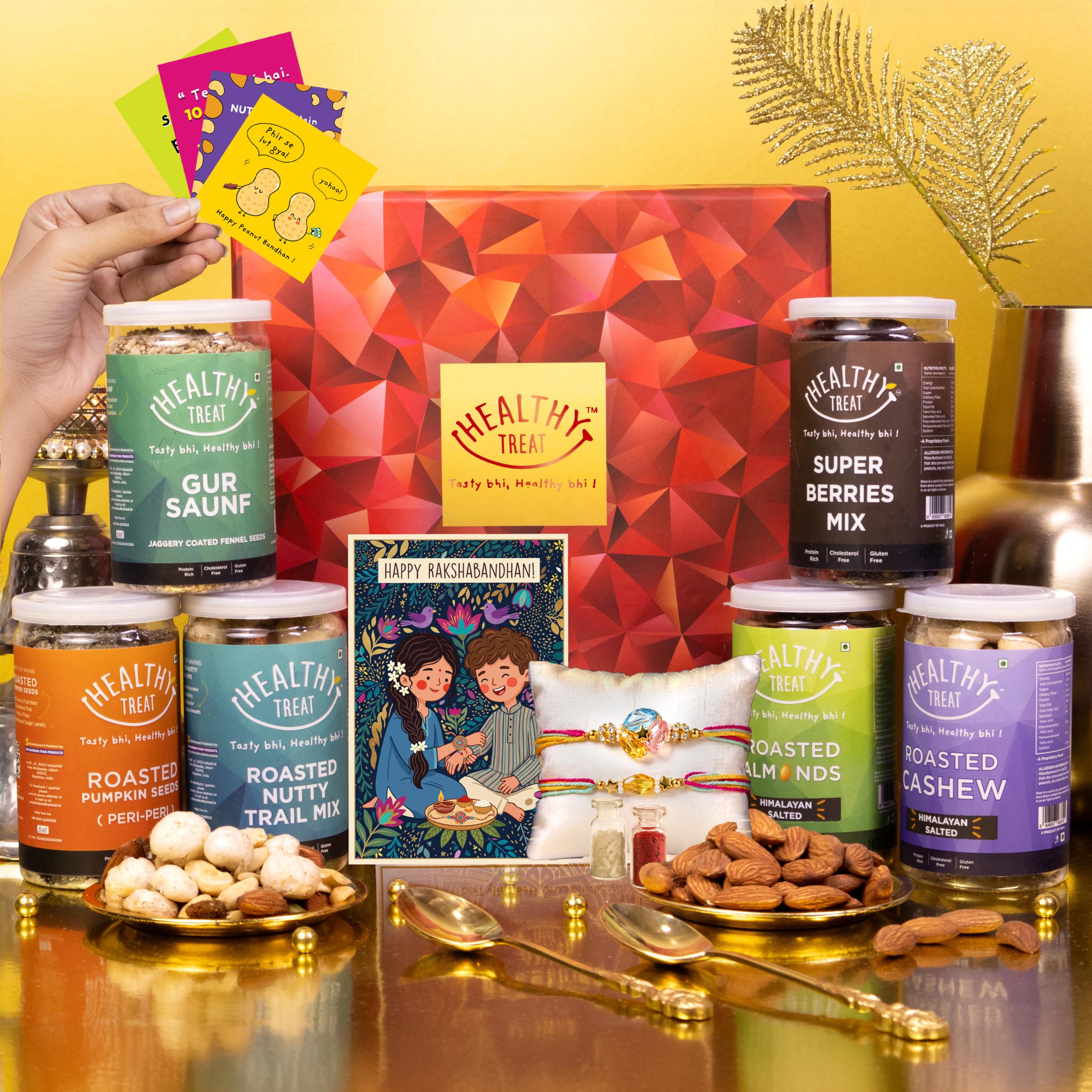 Healthy Treat Royal Rakhi Gift Hamper | Roasted Dry-Fruits & Nuts Gift's Pack | A pair of Rakhii, Roli Chawal, Greeting Card, Rakhi-Themed Stickers | Gifts for Brother and Sister | The Ultimate Raksha Bandhan Hampers