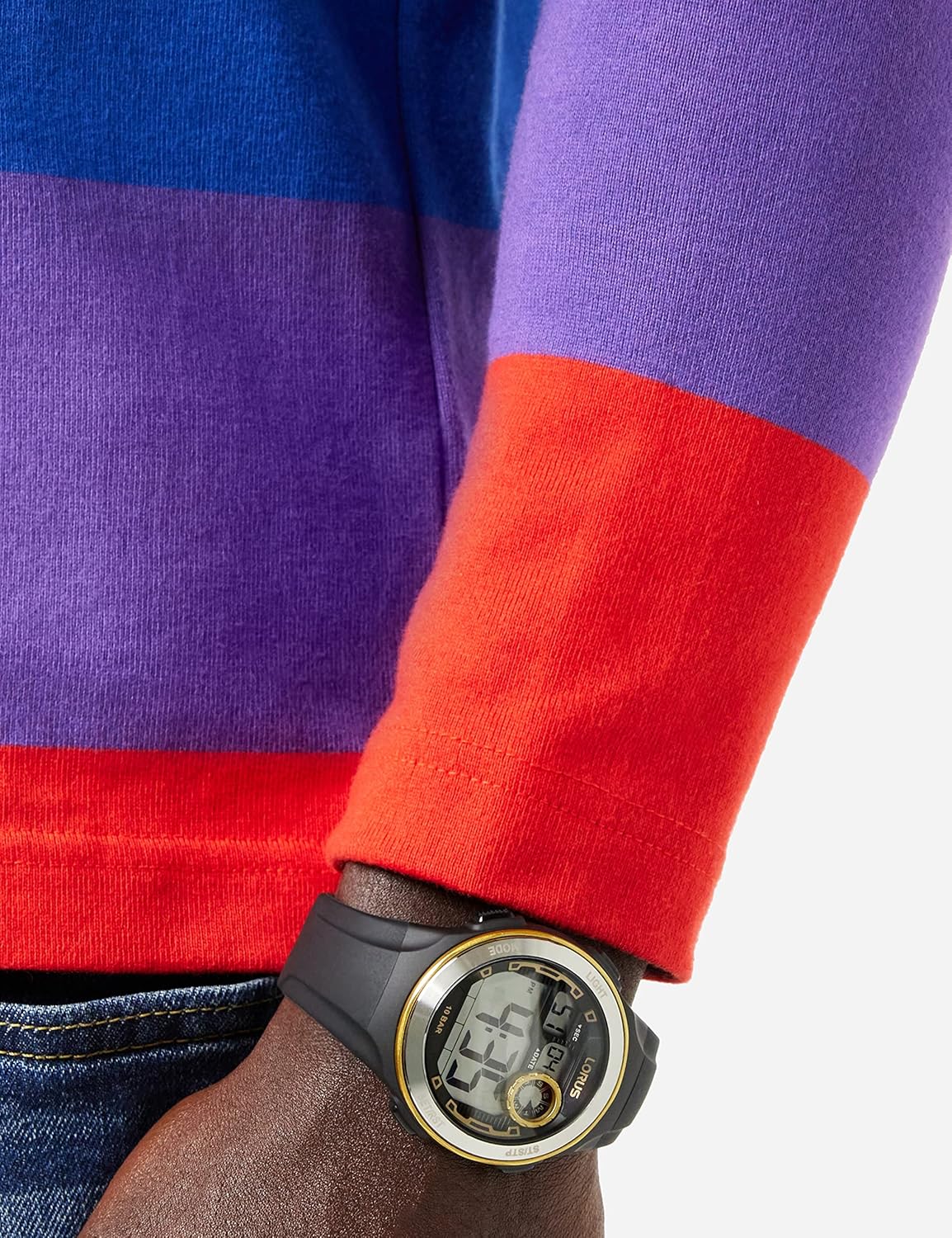 Lorus R2379NX9 digital watch worn on a wrist, showing the comfortable fit of the black silicone strap.